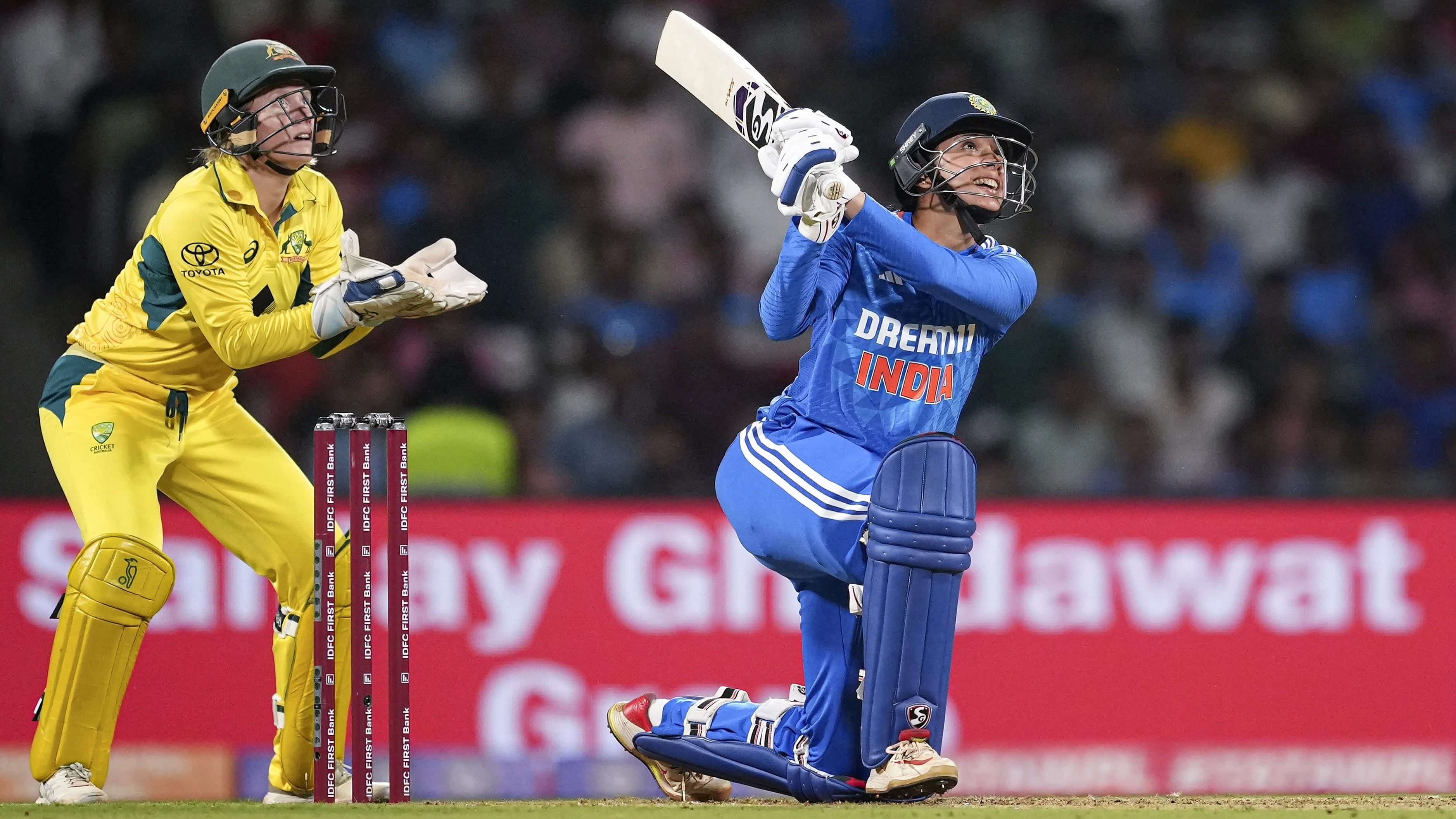 <div class="paragraphs"><p>Navi Mumbai: India's Smriti Mandhana plays a shot during the T20 cricket match between India Women and Australia Women, at DY Patil Stadium in Navi Mumbai, Tuesday, Jan. 9, 2024. </p></div>
