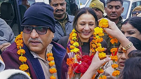 <div class="paragraphs"><p>UP Congress President Ajay Rai with party leader Aradhana Misra being welcomed by supporters upon their arrival in Barabanki, Monday, Jan 15, 2024.</p></div>