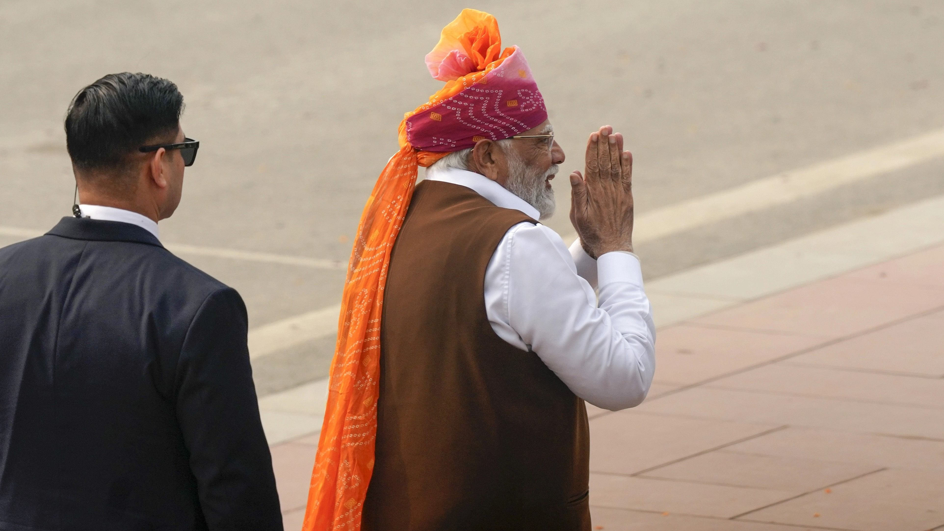 <div class="paragraphs"><p>Prime Minister Narendra Modi acknowledges the crowd as he leaves after the 75th Republic Day function, at the Kartavya Path in New Delhi, Friday, January 26, 2024.</p></div>