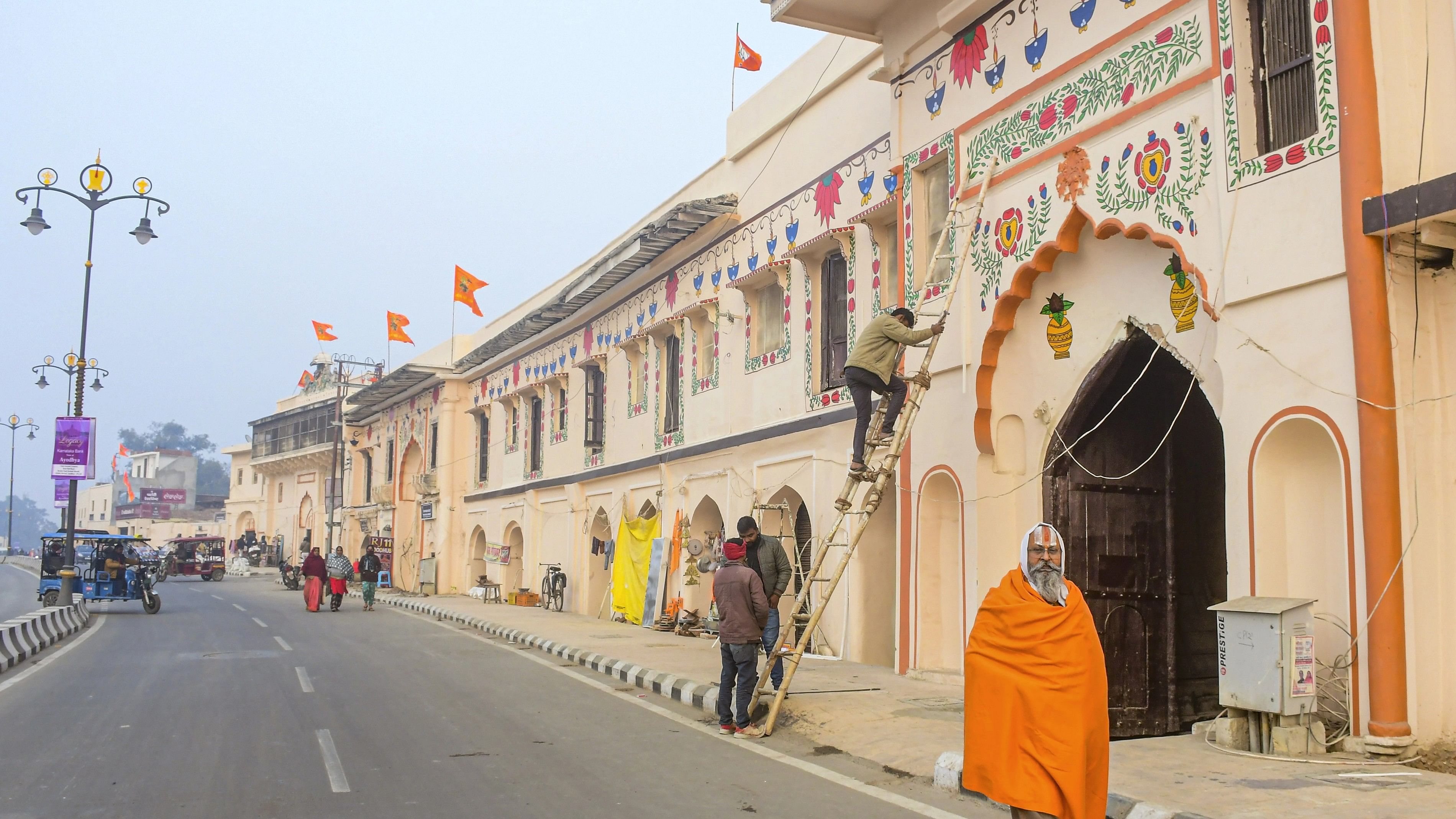 <div class="paragraphs"><p>Artisans create murals to decorate buildings located along the 'Ram Path' ahead of the consecration ceremony of the Shri Ram Janmabhoomi Temple, in Ayodhya, Thursday, Jan. 11, 2024. </p></div>