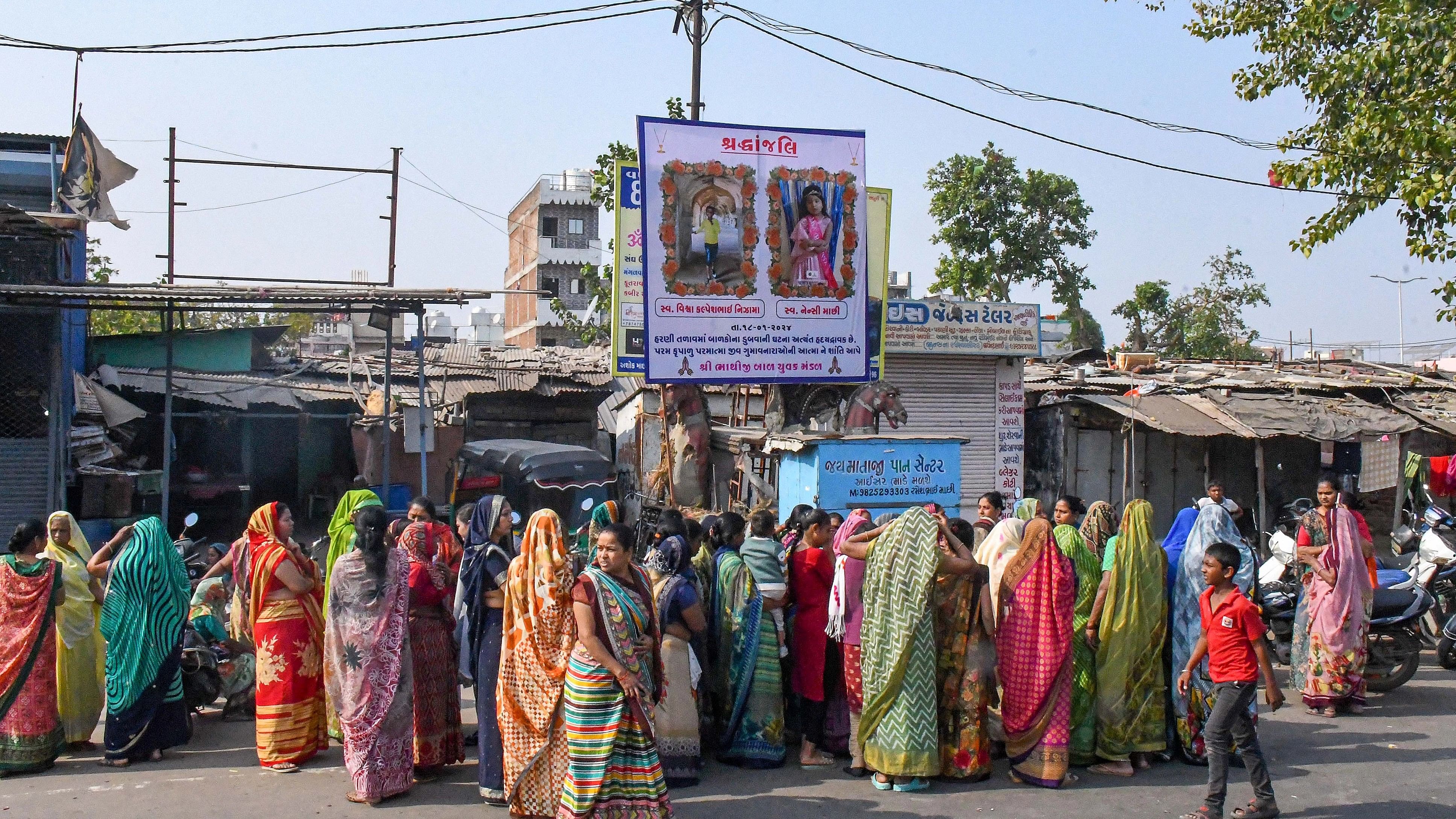 <div class="paragraphs"><p>Grieving family members of the deceased, who died after a boat capsized at Harni lake on the outskirts of Vadodara.</p></div>