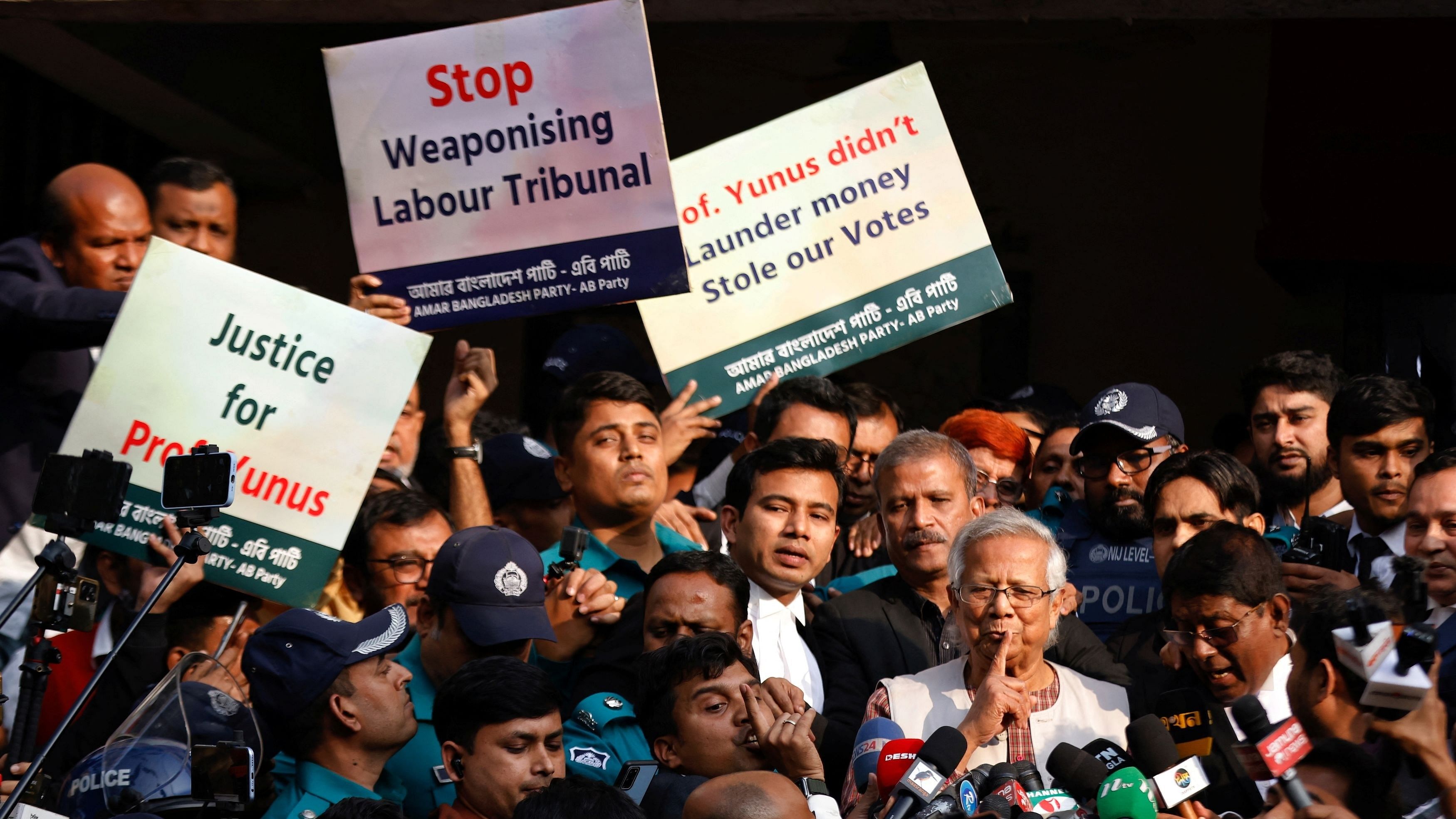 <div class="paragraphs"><p>Bangladeshi Nobel peace laureate Professor Muhammad Yunus gestures in front of the court after being sentenced for six months of imprisonment and fined BDT 5,000 in a labour law violation case, in Dhaka, Bangladesh, January 1, 2024. </p></div>