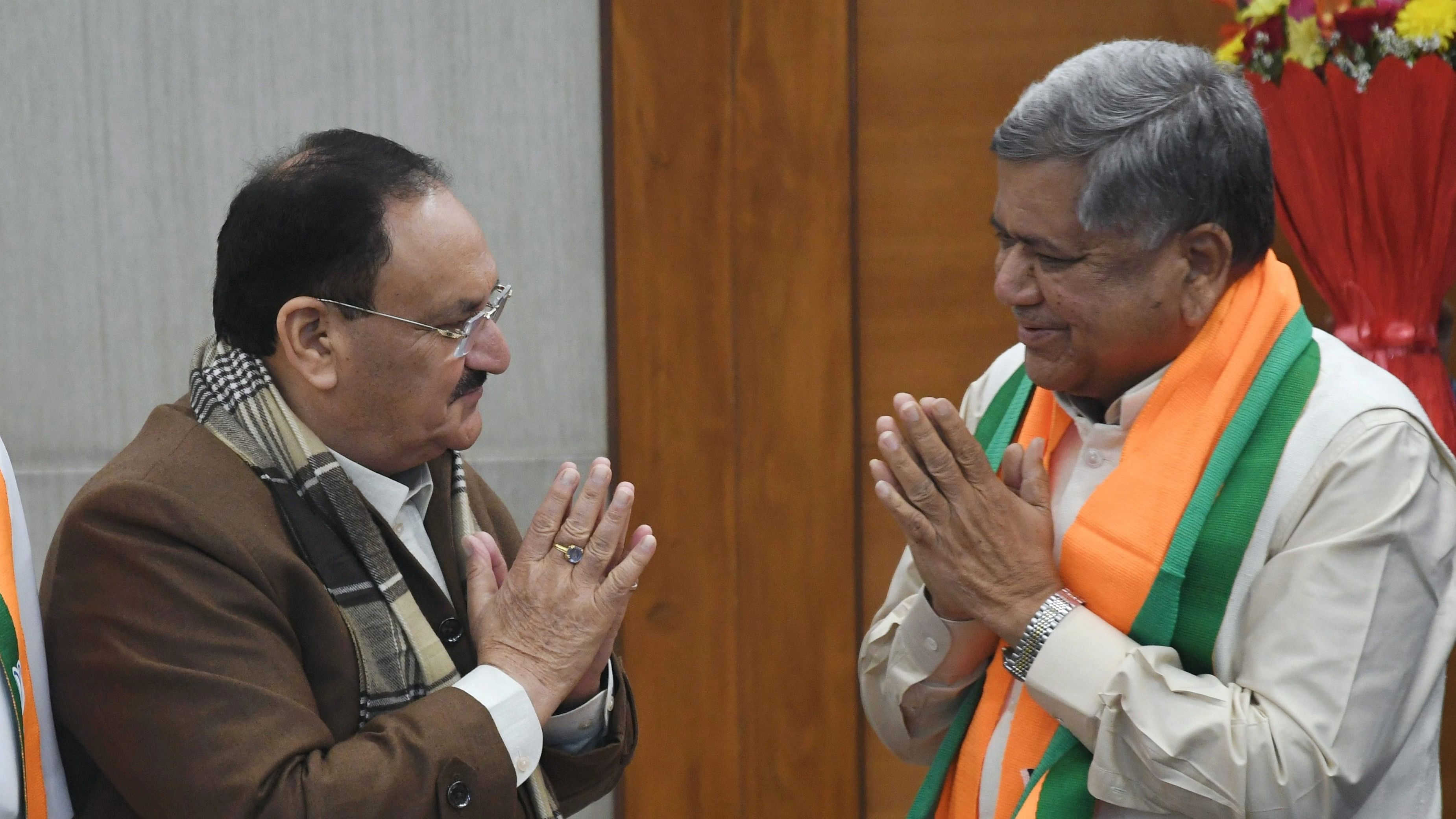 <div class="paragraphs"><p>Former Karnataka CM Jagadish Shettar who rejoined BJP being welcomed by the party chief J P Nadda, in New Delhi, Thursday, January 25, 2024.  </p></div>