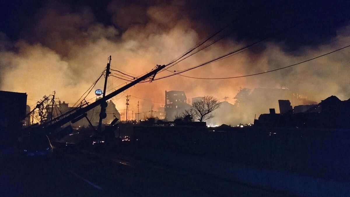 <div class="paragraphs"><p>Fire burns following an earthquake at a residential area in Wajima</p></div>