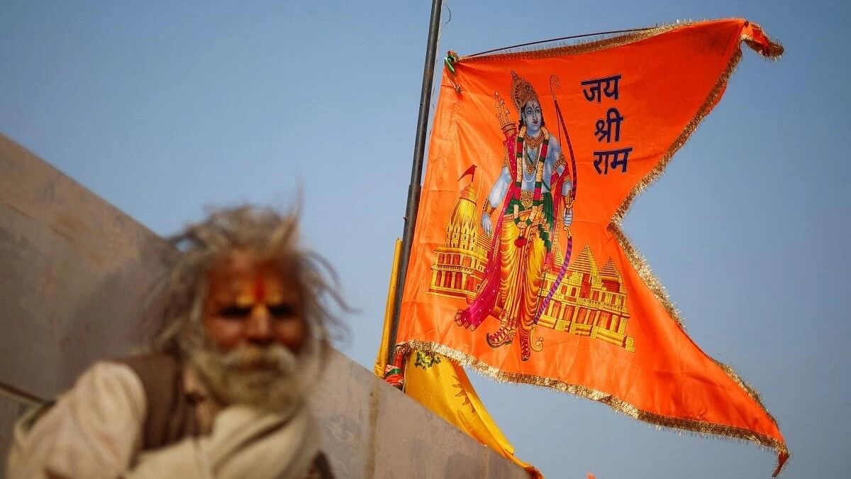 <div class="paragraphs"><p>A man looks on, outside the temple of Lord Ram, on the eve of its opening, in Ayodhya, January 21, 2024.</p></div>