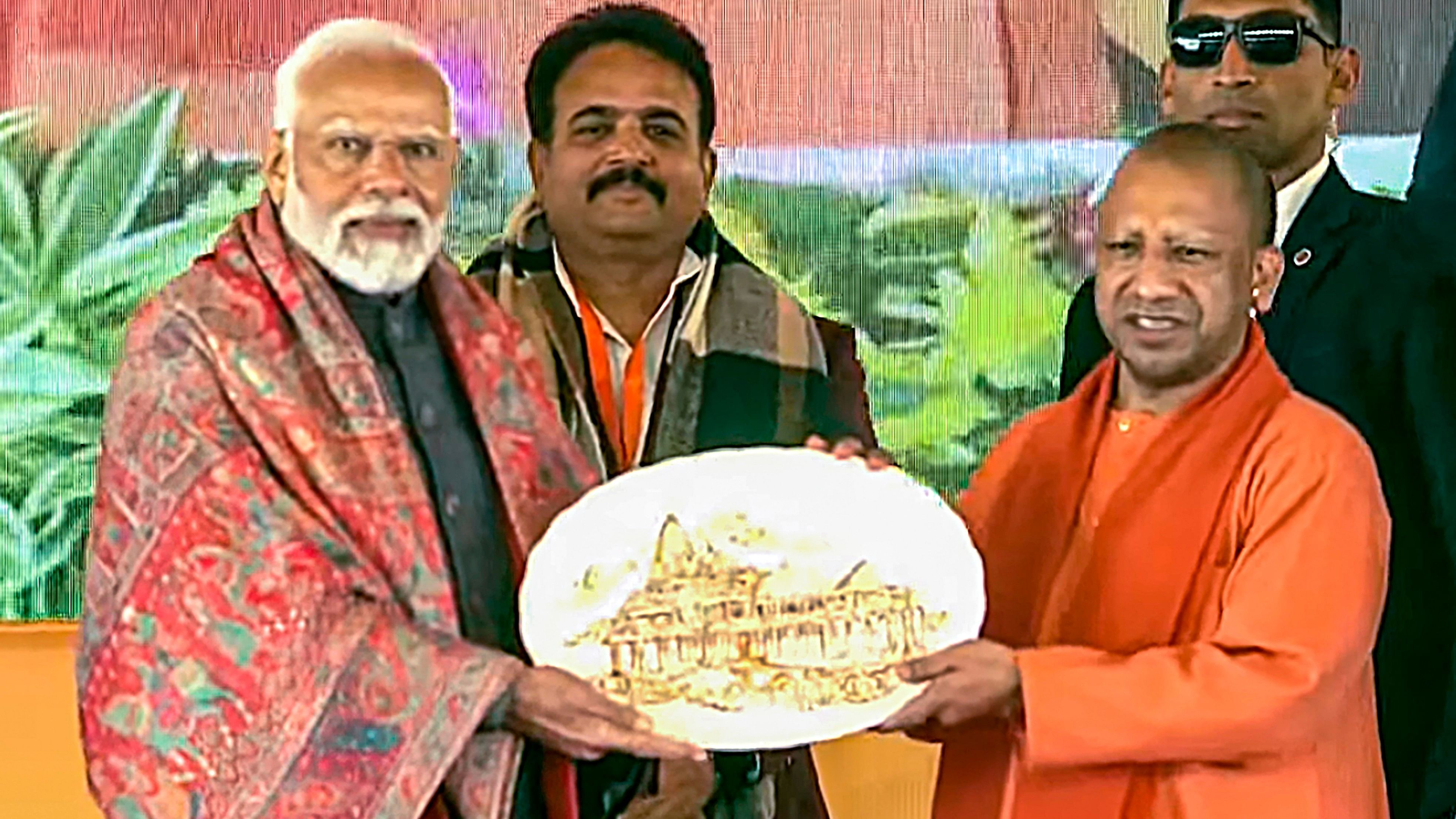 <div class="paragraphs"><p>Prime Minister Narendra Modi being presented with a statue of Lord Ram by Uttar Pradesh Chief Minister Yogi Adityanath in Bulandshahr.</p></div>