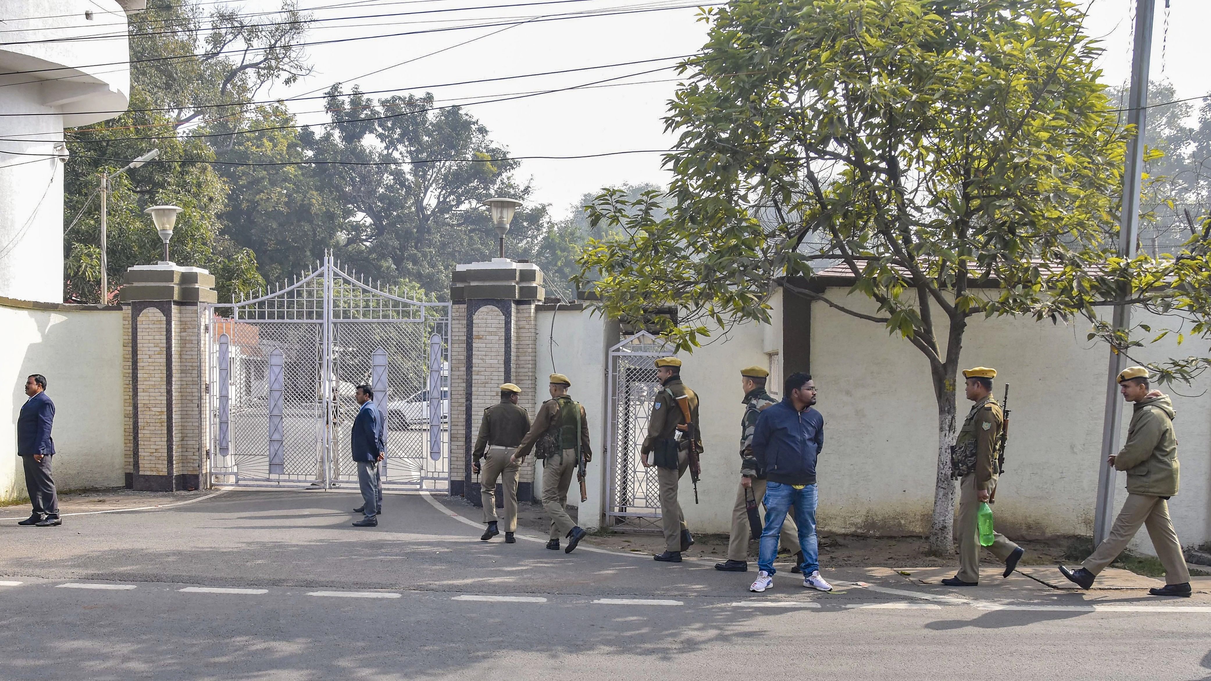 <div class="paragraphs"><p>Security personnel stand guard outside Jharkhand Chief Minister Hemant Soren's official residence, ahead of the scheduled questioning of CM Soren by the Enforcement Directorate&nbsp;in a money laundering case linked to an alleged land scam, in Ranchi.</p></div>
