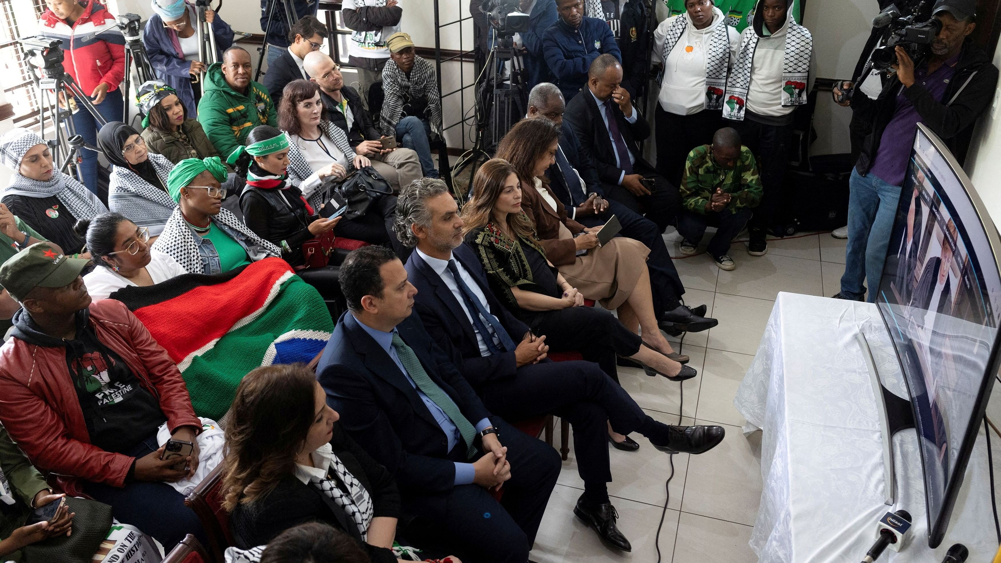 <div class="paragraphs"><p>Ahmed El Fadly, Egyptian ambassador to South Africa, Kabalan Frangieh, Lebanon ambassador to South Africa, Hanan Jarrar, Palestinian ambassador to South Africa and Aysegul Kandas, Turkish ambassador to South Africa as Pro-Palestinian supporters gather to watch the South African Government's genocide case at the International Court of Justice in the Hague, which accuses Israel of genocide in the Gaza war, at the headquarters of the Palestinian mission in Pretoria, South Africa on January 11, 2024. </p></div>