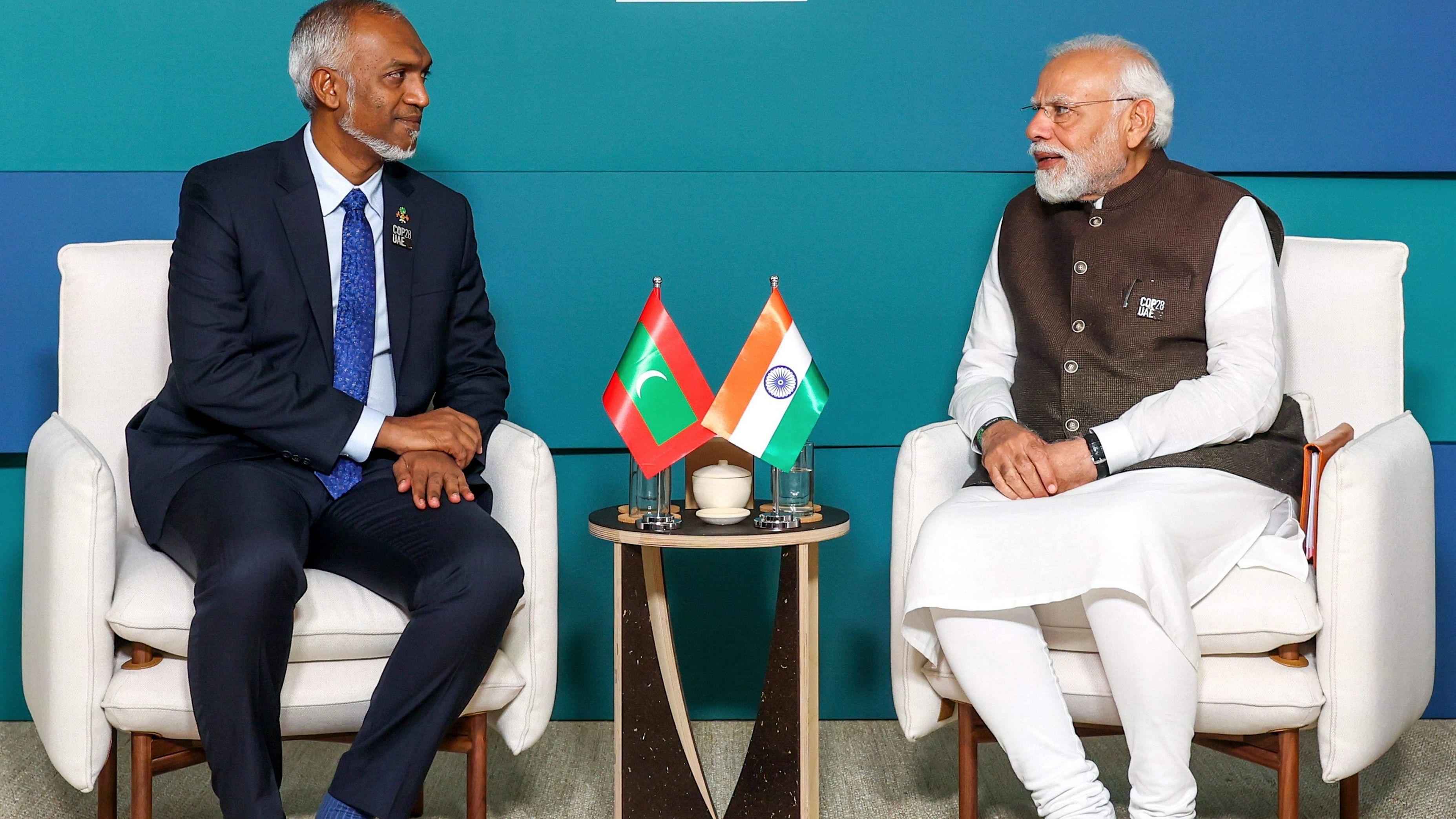 <div class="paragraphs"><p>Prime Minister Narendra Modi and President of Maldives Mohamed Muizzu during the COP28, in UAE. The Maldivian government on Sunday, Jan 7, 2024, distanced itself from a minister's 'derogatory remarks' against Prime Minister Narendra Modi on social media.</p></div>
