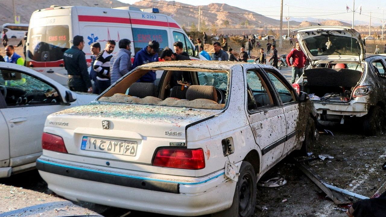 <div class="paragraphs"><p>People gather at the scene of explosions during a ceremony held to mark the death of late Iranian General Qassem Soleimani, in Kerman, Iran, January 3, 2024. </p></div>