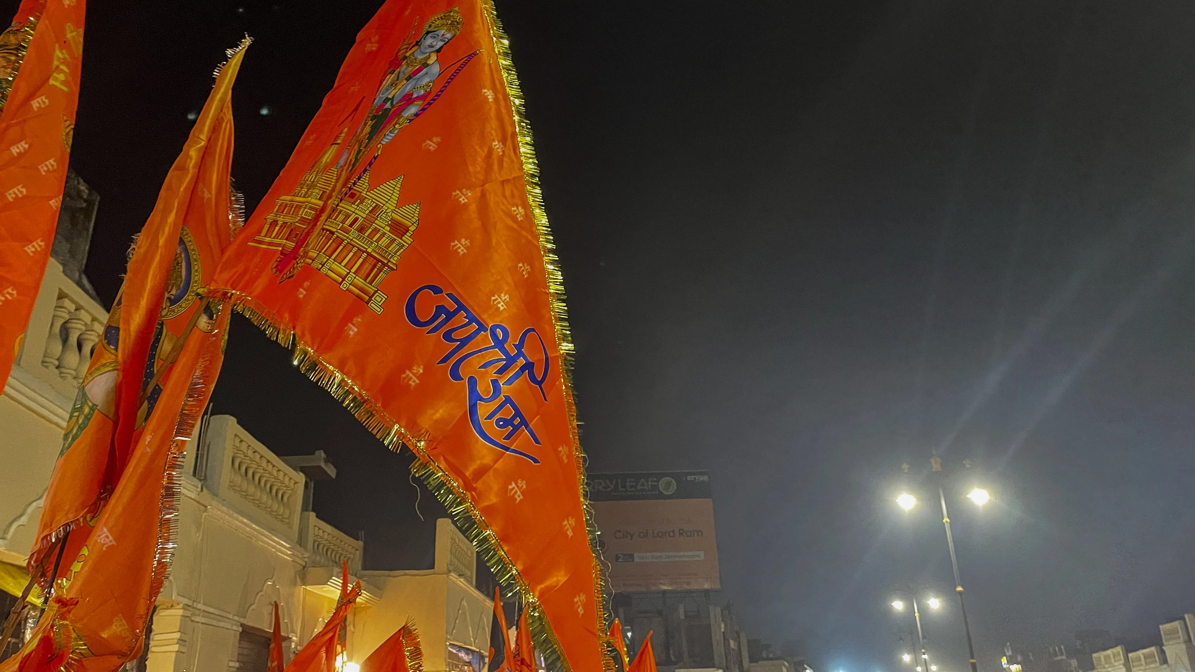 <div class="paragraphs"><p>Saffron flags bearing images of Lord Ram and the upcoming grand temple on display in front of shops along Ram Path, in Ayodhya. </p></div>