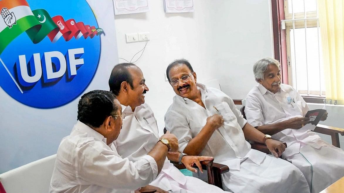 <div class="paragraphs"><p>File photo of leaders M M Hassan, Opposition Leader VD Satheesan, KPCC President K Sudhakaran and late Kerela chief minister Oommen Chandy at a UDF meeting. </p></div>