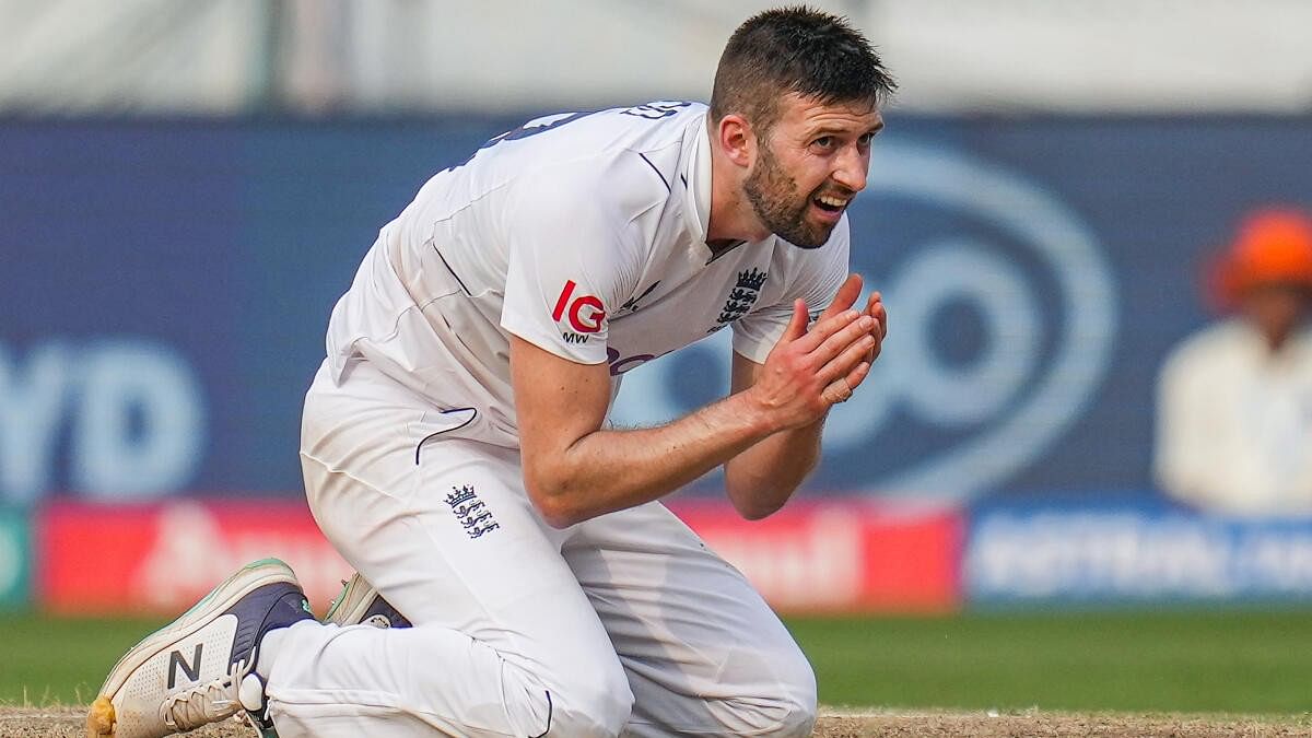 <div class="paragraphs"><p>England's Mark Wood reacts after bowling a delivery on the second day of the first cricket test match between India and England, at Rajiv Gandhi International Cricket Stadium, in Hyderabad, Friday, Jan 26, 2024</p></div>