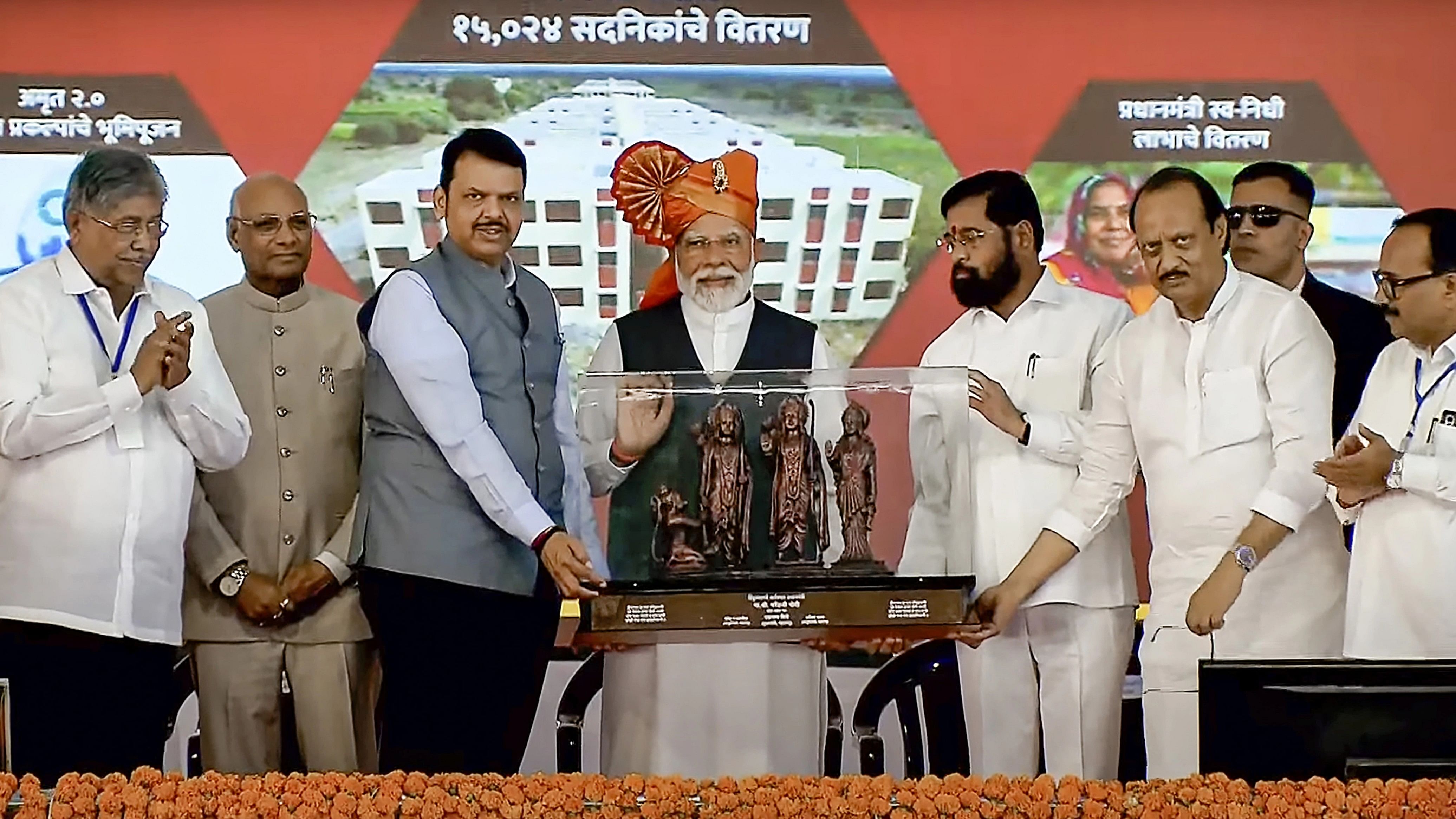 <div class="paragraphs"><p>Prime Minister Narendra Modi with Maharashtra Governor Ramesh Bais, Chief Minister Eknath Shinde, Deputy Chief Ministers Devendra Fadnavis and Ajit Pawar and others during the foundation stone laying ceremony of eight AMRUT (Atal Mission for Rejuvenation and Urban Transformation) projects in Maharashtra worth around Rs 2,000 crore, in Solapur, Friday, Jan. 19, 2024. </p></div>