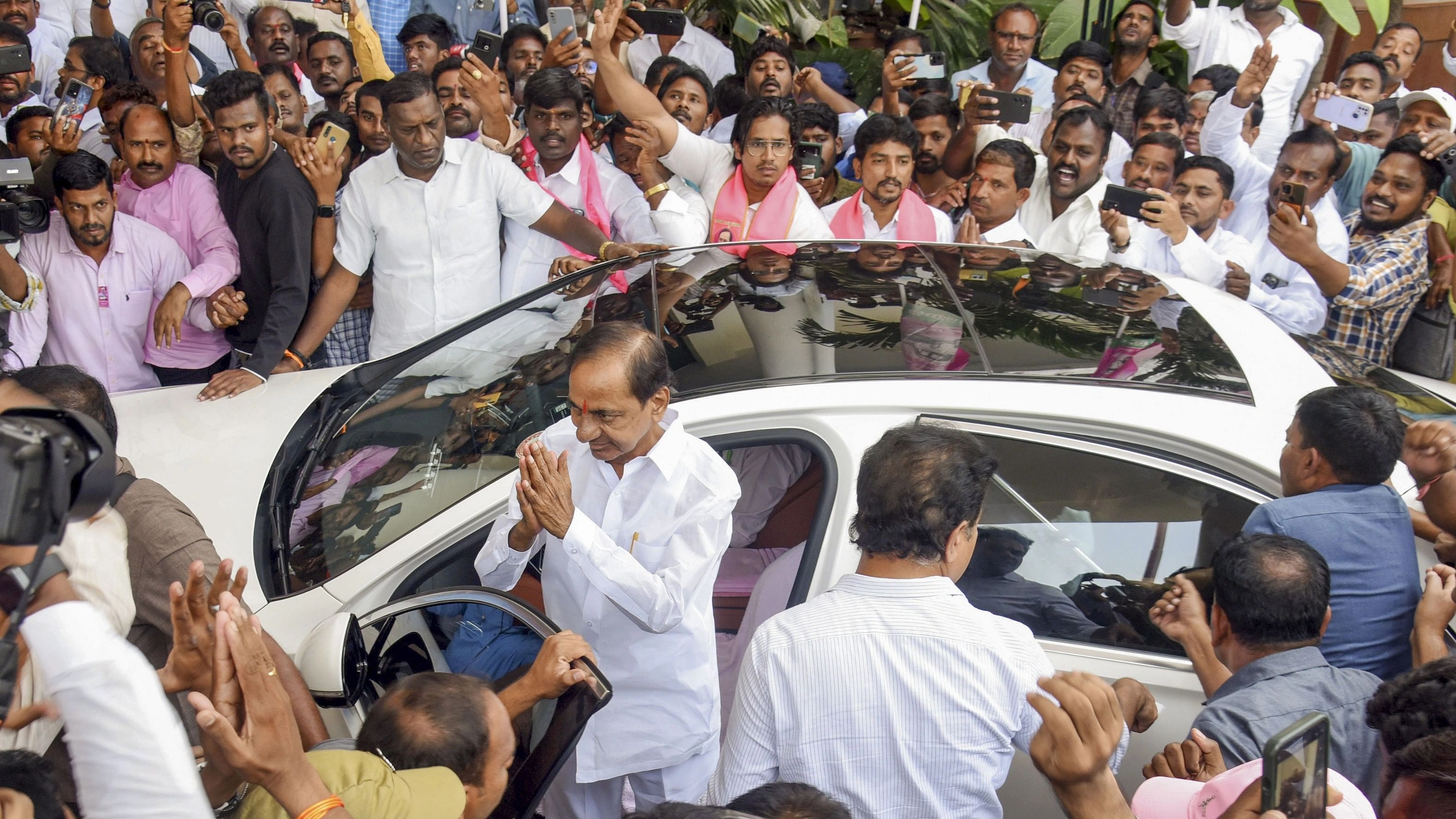 <div class="paragraphs"><p>Former Telangana CM K Chandrashekar Rao greets supporters as he arrives at the BRS Bhavan, in Hyderabad, Tuesday, Feb. 6, 2024.</p></div>