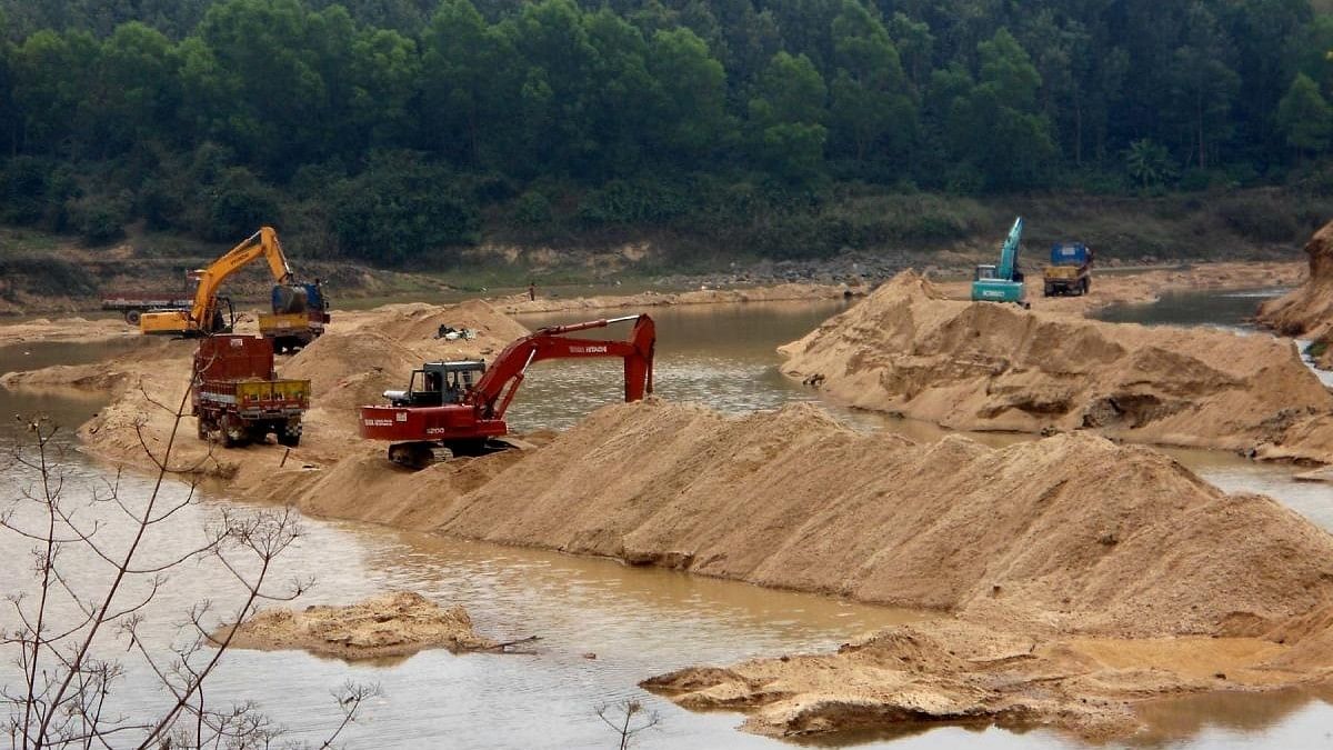 <div class="paragraphs"><p>A file photo of excavators extracting sand.</p></div>