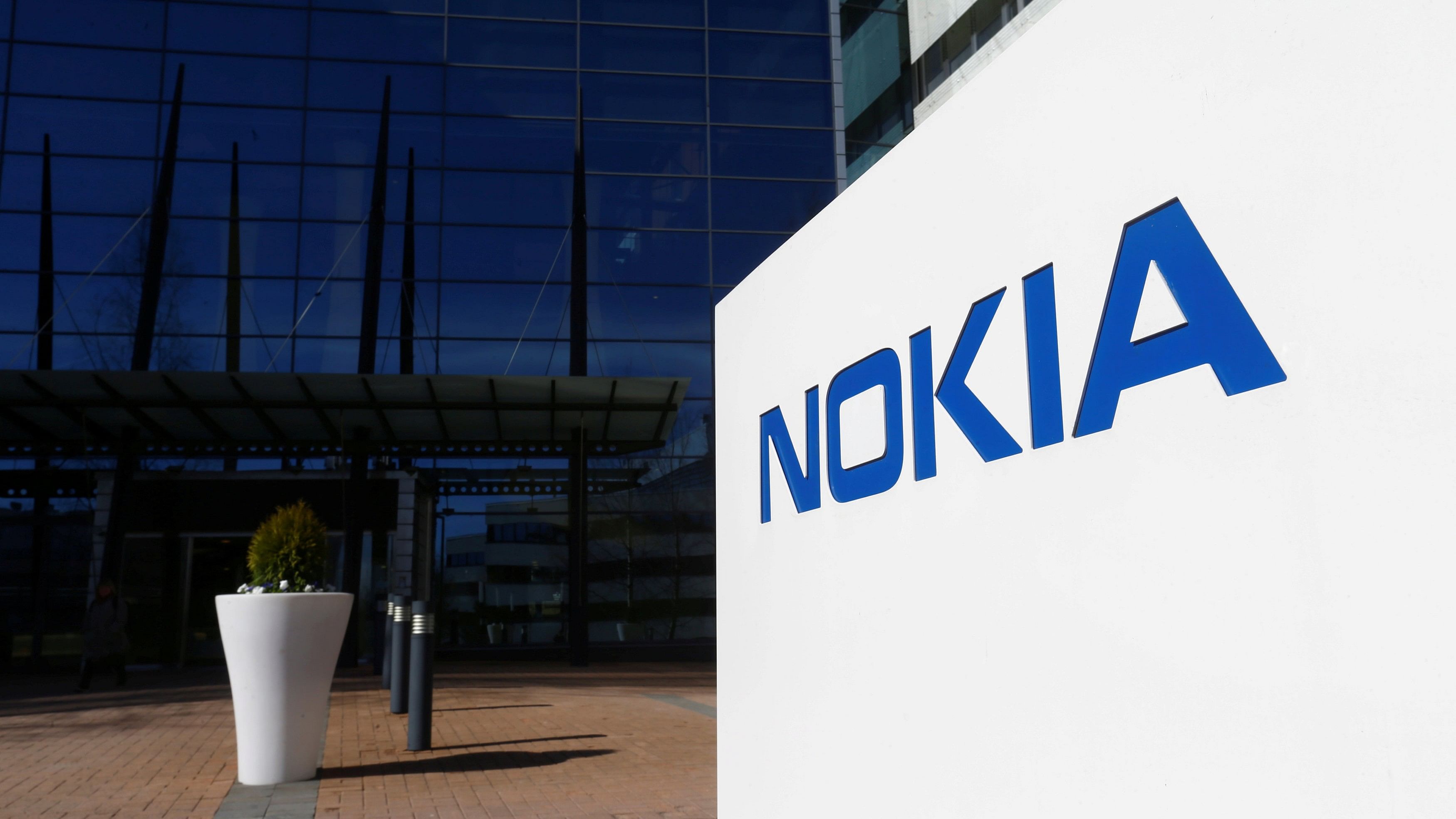 <div class="paragraphs"><p>A file photo of a Nokia logo at  company's headquarters</p></div>