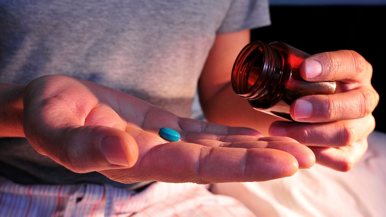 <div class="paragraphs"><p>Representative image showing a man taking a pill.</p></div>