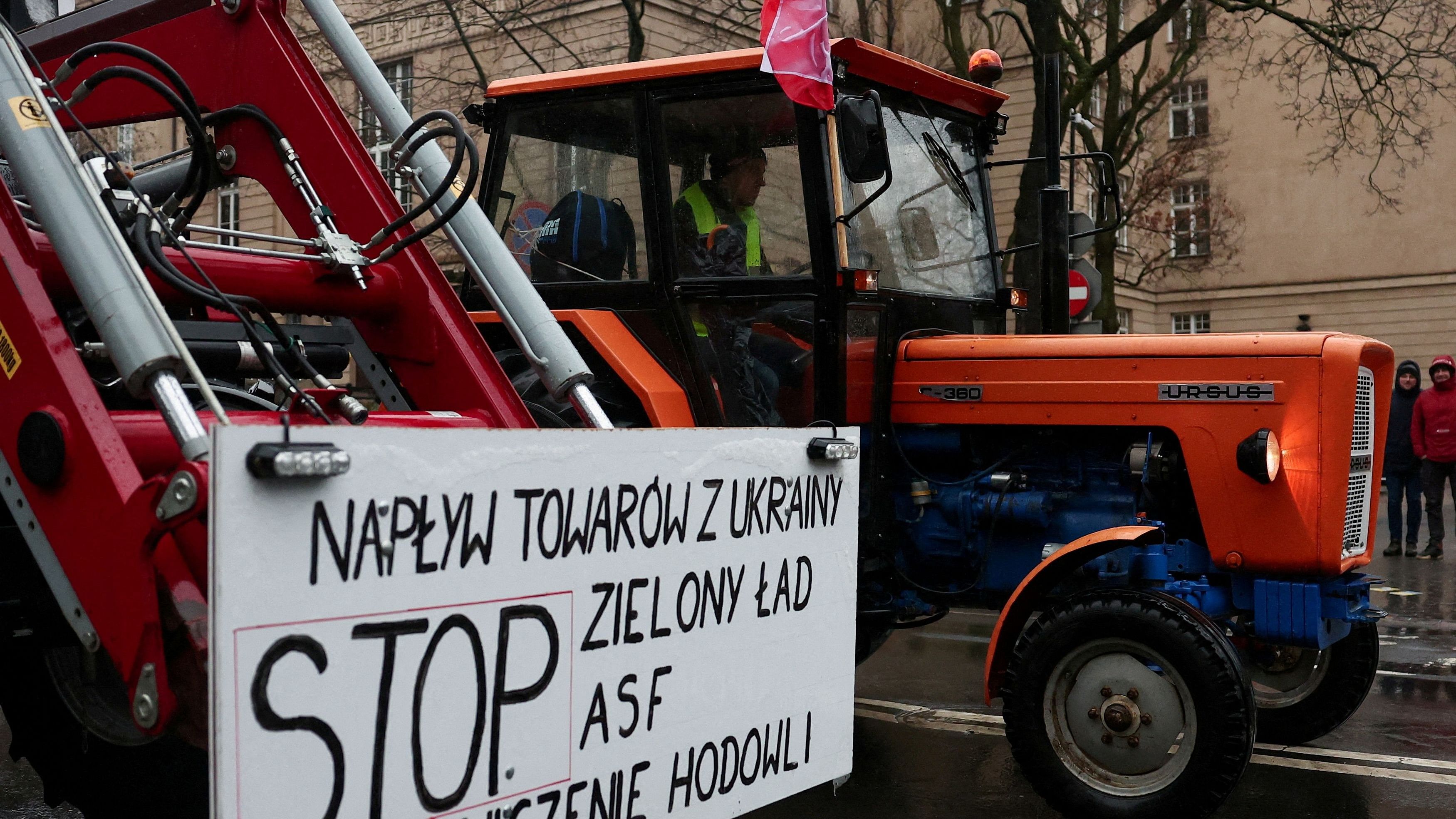 <div class="paragraphs"><p>A Polish farmer uses a tractor on a road during a protest over price pressures, taxes and green regulation, grievances shared by farmers across Europe, in Poznan, Poland, February 9, 2024. </p></div>