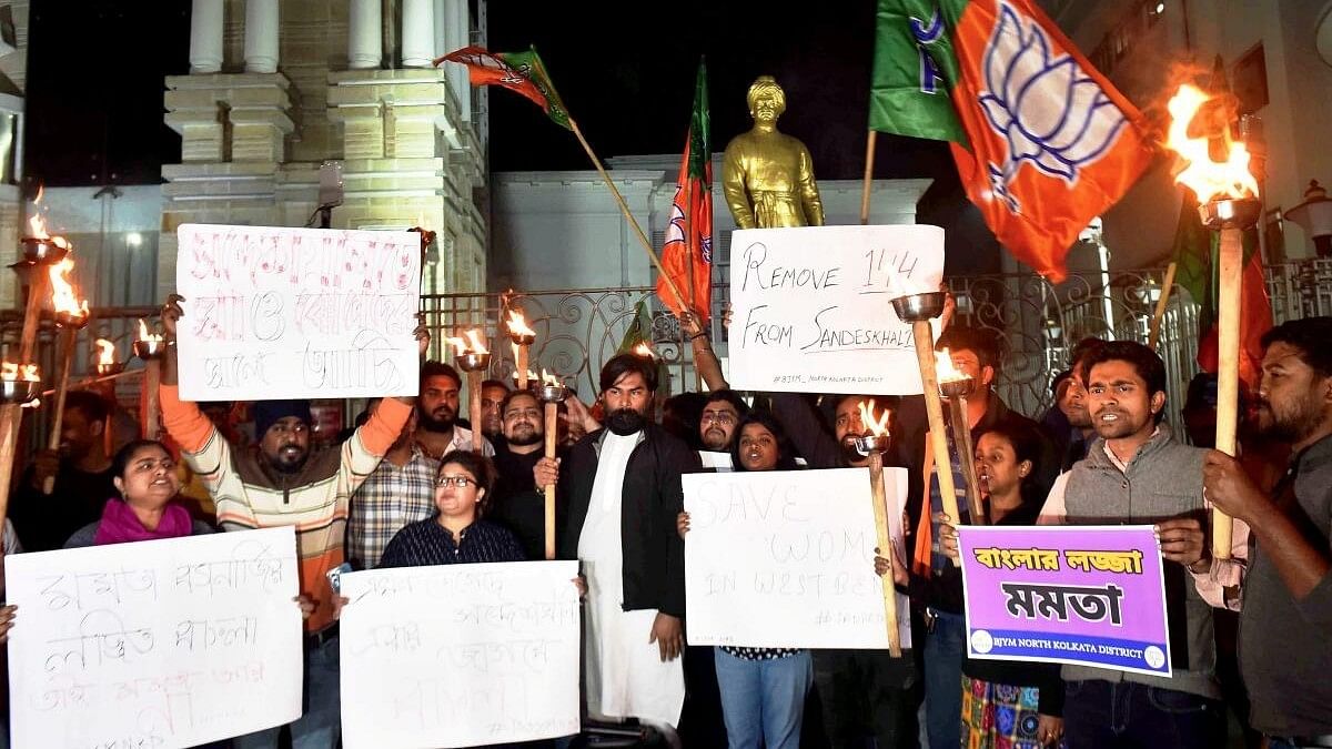 <div class="paragraphs"><p>Activists of BJP Yuva Morcha stage a protest against TMC workers who allegedly disrespected the modesty of women in Sandeshkhali, in Kolkata.</p></div>