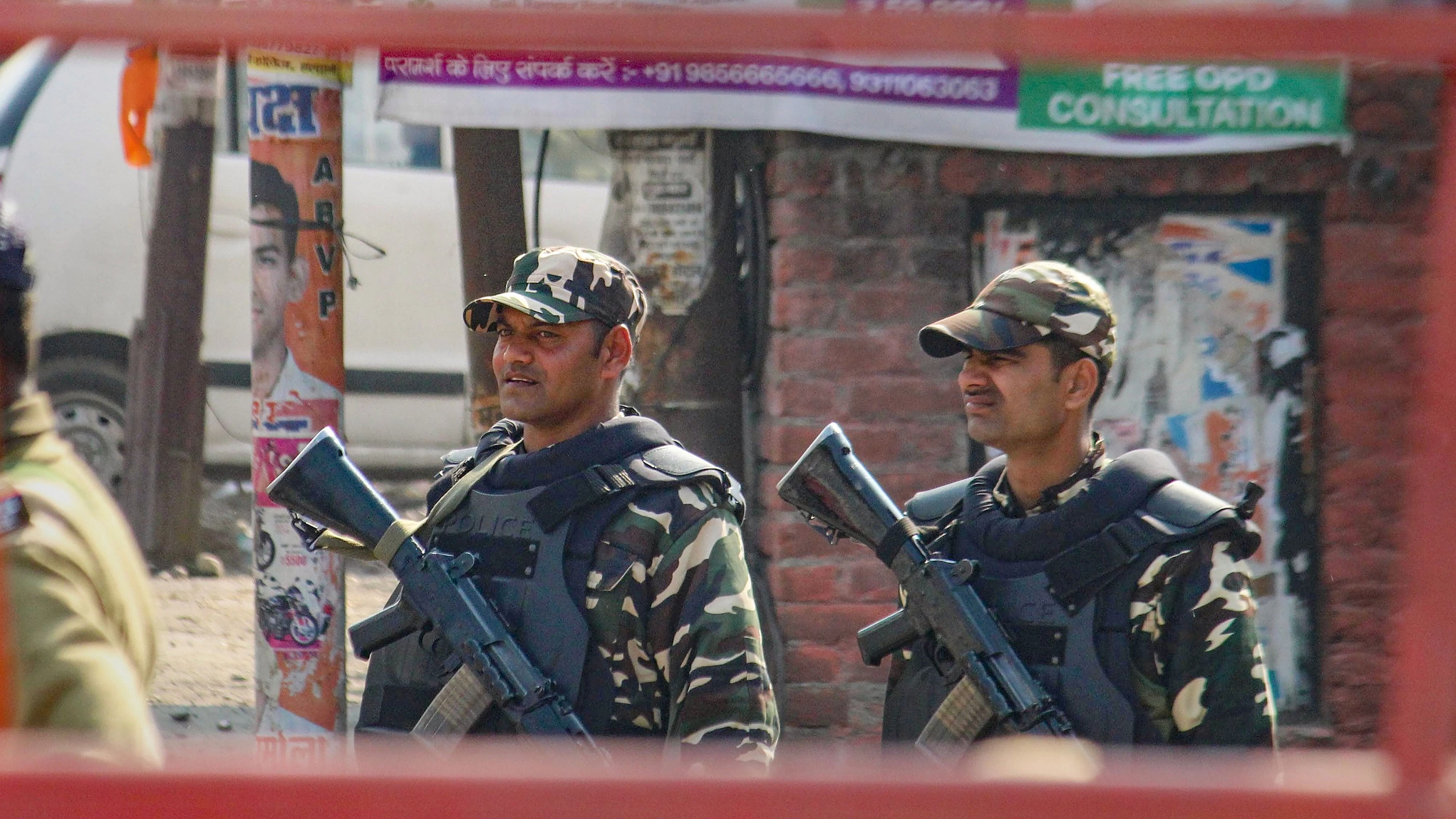 <div class="paragraphs"><p>Haldwani: Security personnel stand guard during curfew at Banbhoolpura area that witnessed arson and vandalism by a mob over the demolition of an allegedly illegally-built madrasa on Thursday, in Haldwani, Saturday, Feb. 10, 2024. </p></div>