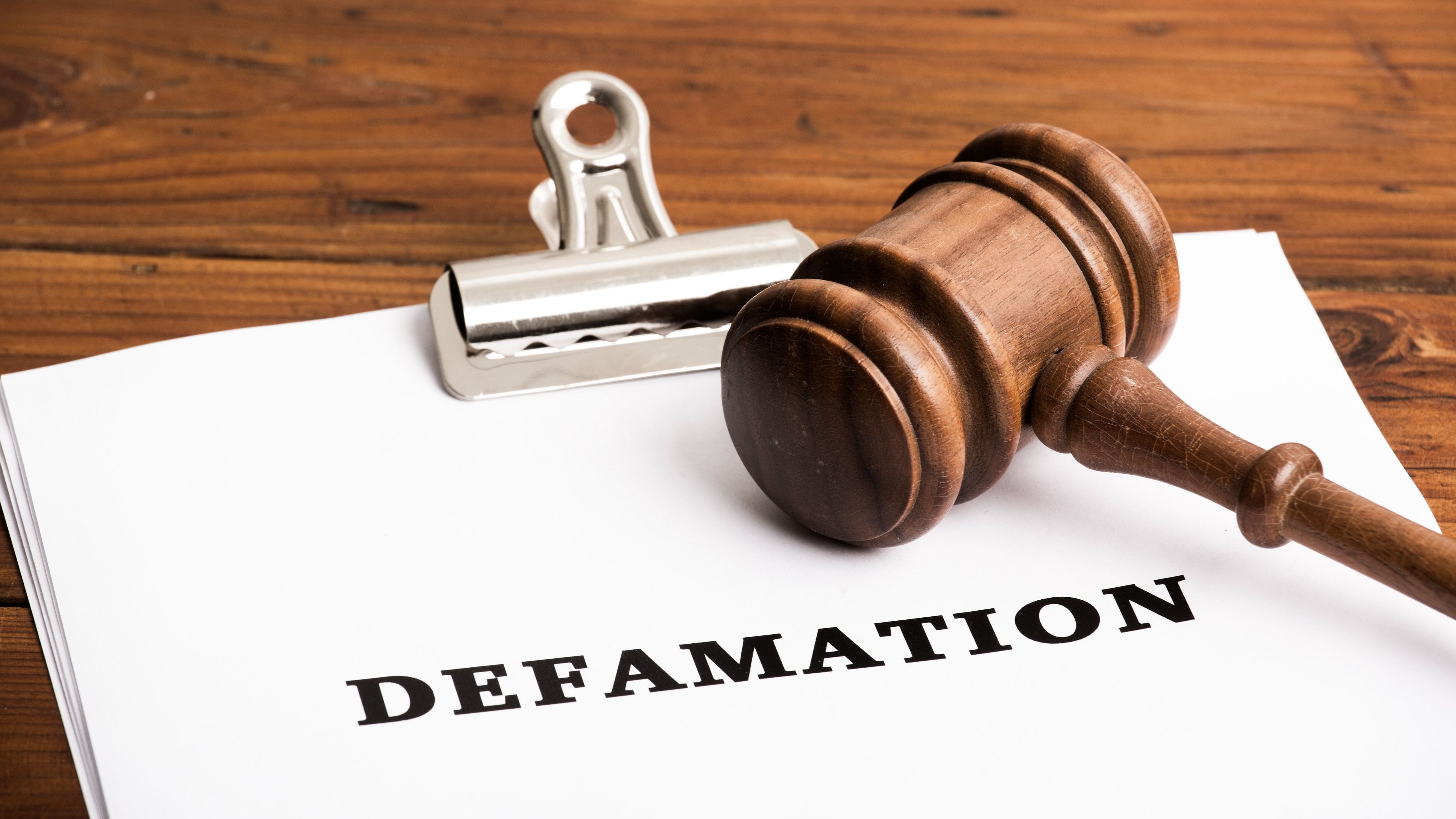 <div class="paragraphs"><p>Defamation file in court with gavel(Representative a=image)</p></div>