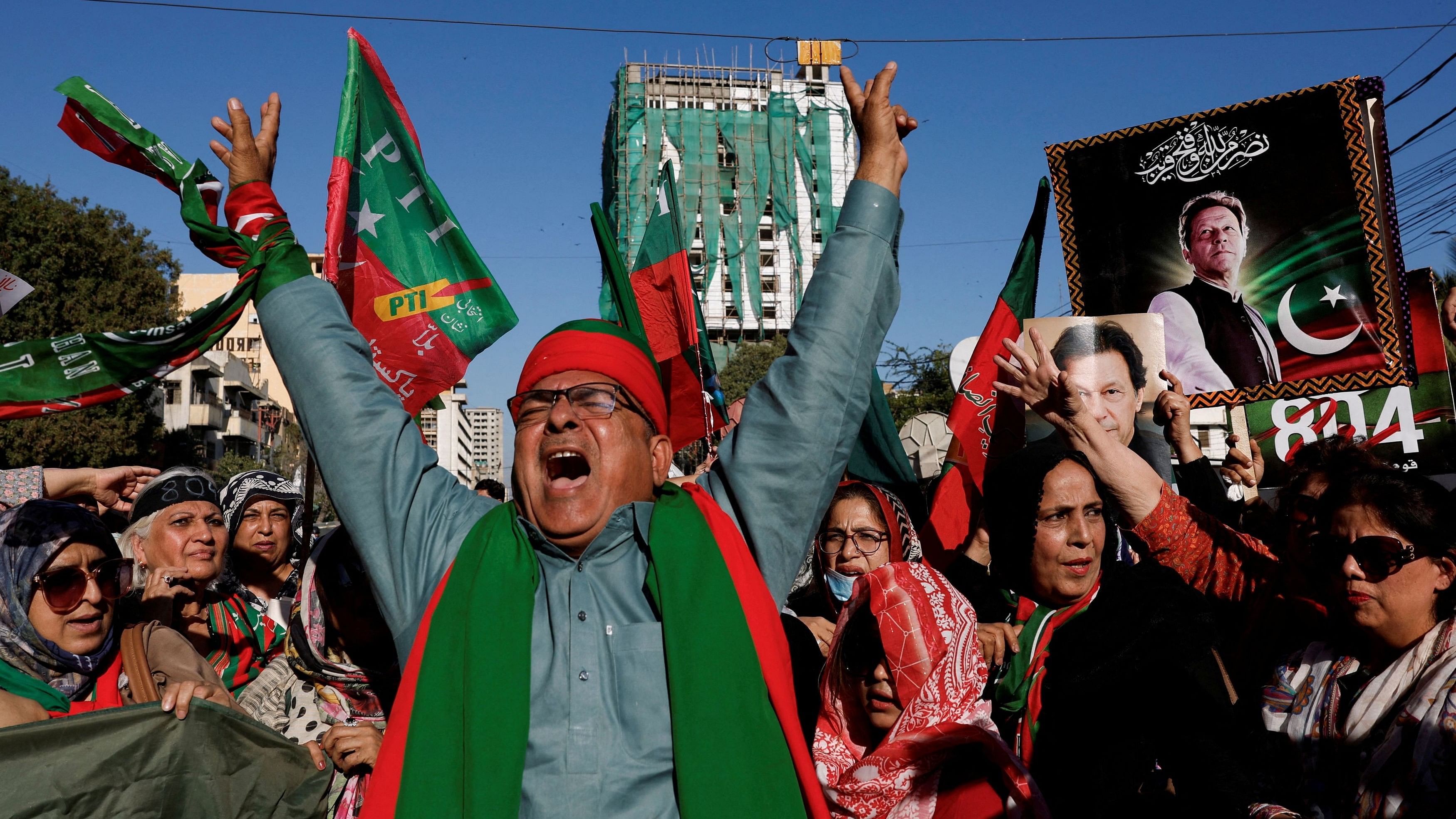 <div class="paragraphs"><p>Supporters of former Prime Minister Imran Khan's party, the Pakistan Tehreek-e-Insaf , chant slogans as they gather during a protest demanding free and fair results of the elections, outside the provincial election commission office in Karachi, Pakistan February 17, 2024. </p></div>