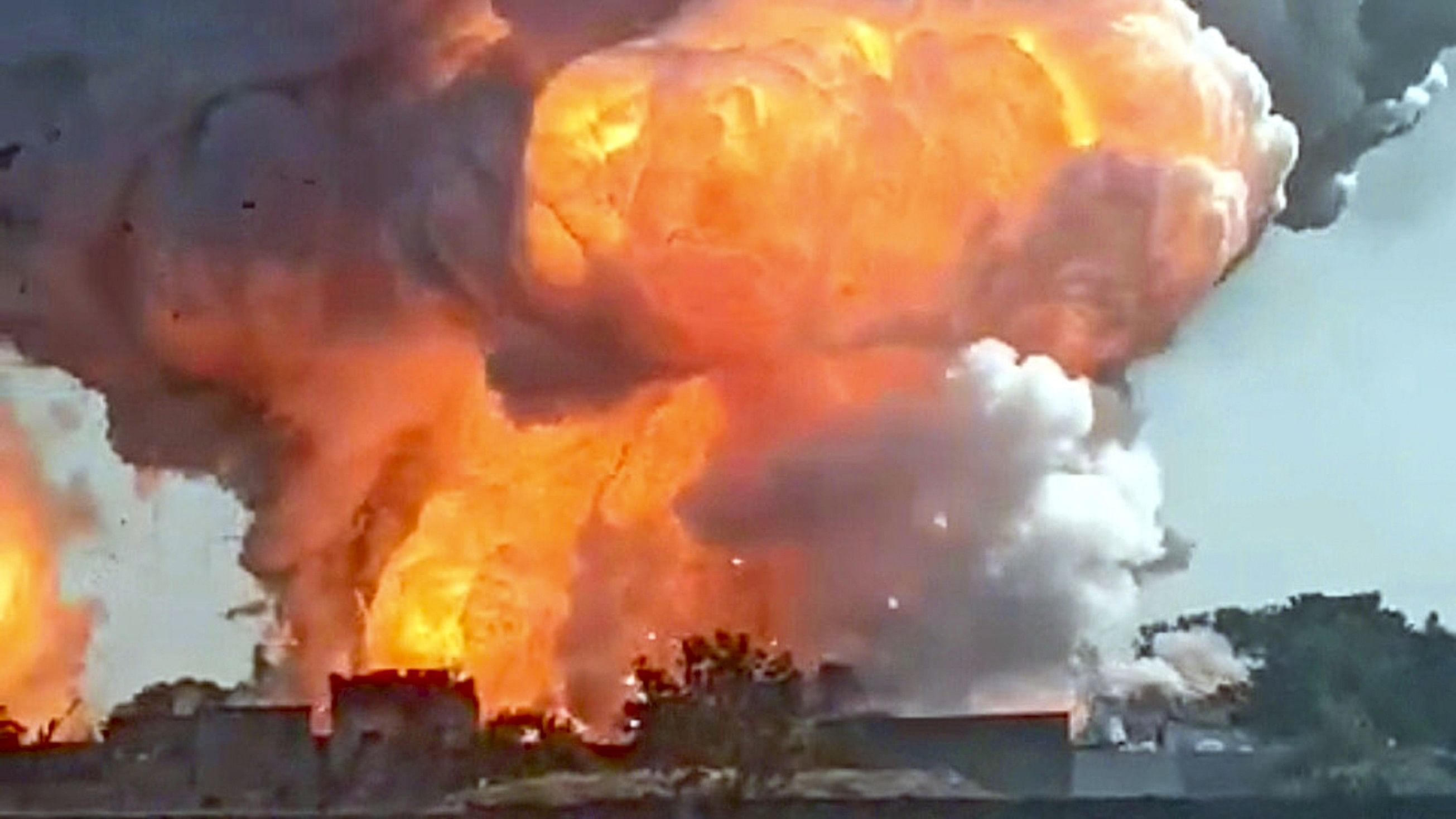 <div class="paragraphs"><p>Smoke rises after a massive fire broke out in a firecracker factory in Harda town, Madhya Pradesh, on Tuesday.</p></div>