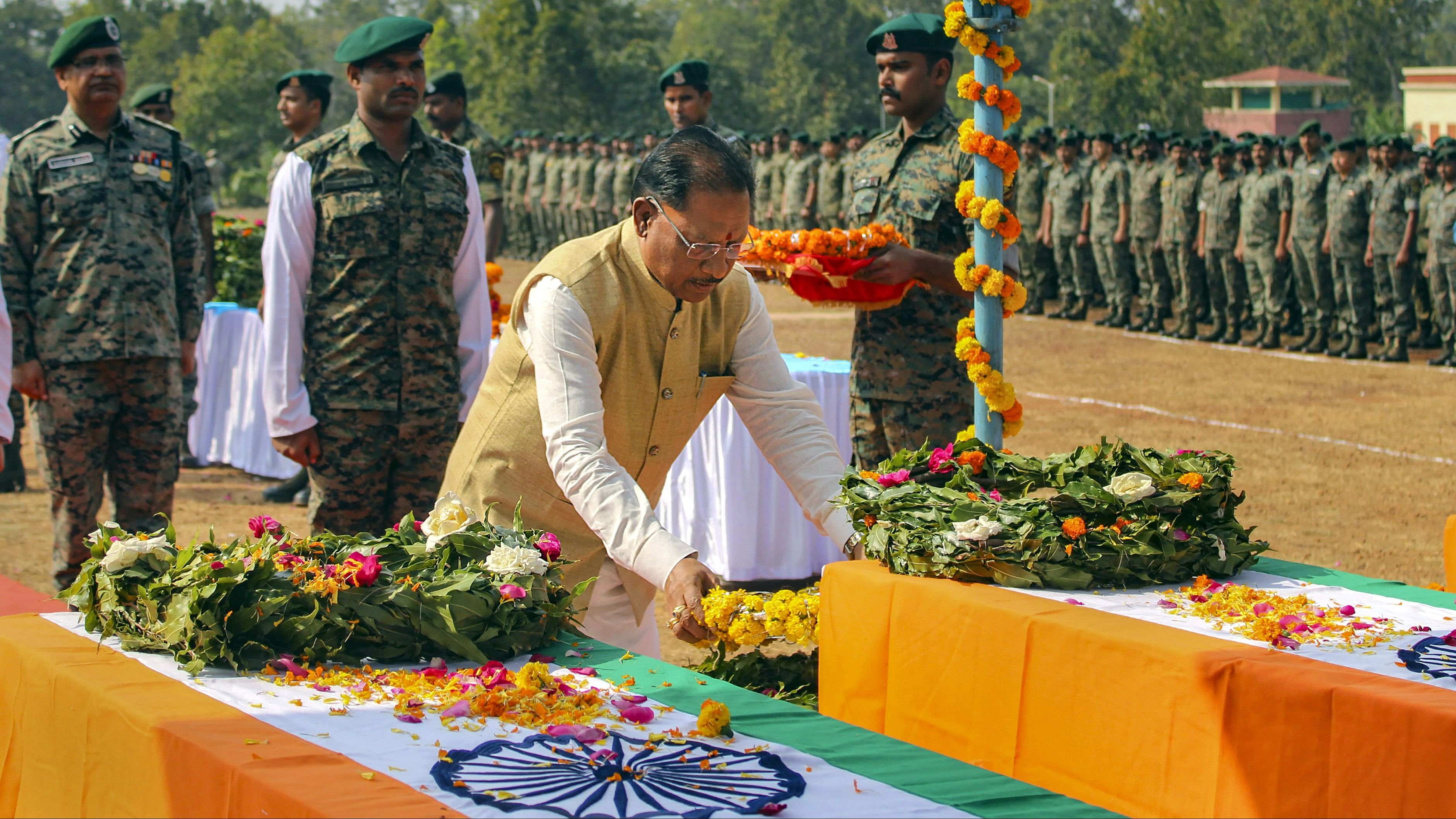 <div class="paragraphs"><p> Chhattisgarh Chief Minister Vishnu Deo Sai pays his last respects to CRPF personnel who lost their lives in a Naxal attack, in Jagdalpur, Wednesday, January 31, 2024. </p></div>