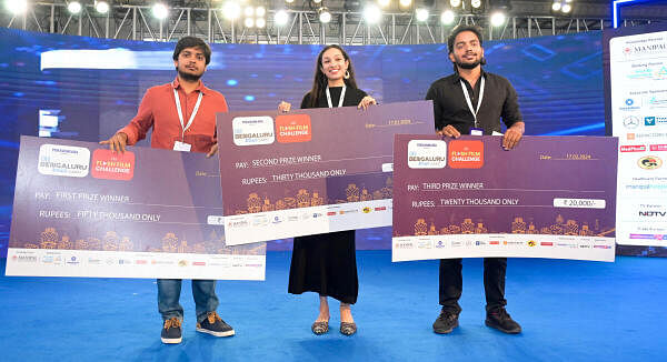 <div class="paragraphs"><p>Winners of the DH Flash Film Challenge — Vallabha, Chandana Nag and Gagan, felicitated at Deccan Herald 2040 Summit in Bengaluru on Saturday. </p></div>