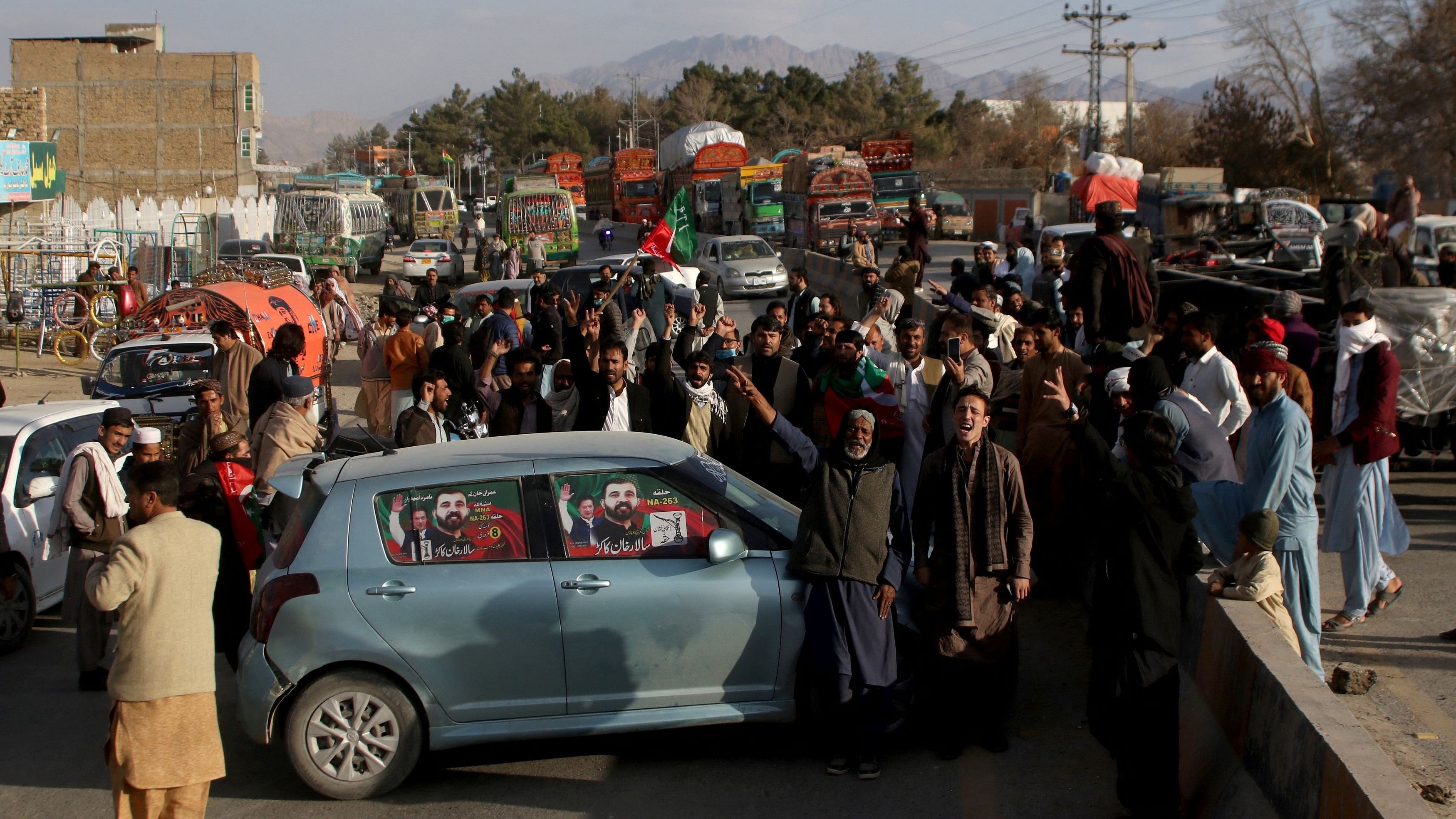 <div class="paragraphs"><p>Voters in Pakistani block a road to protest against the results of the general election, at Baleli, on the outskirts of Quetta, Pakistan.</p></div>