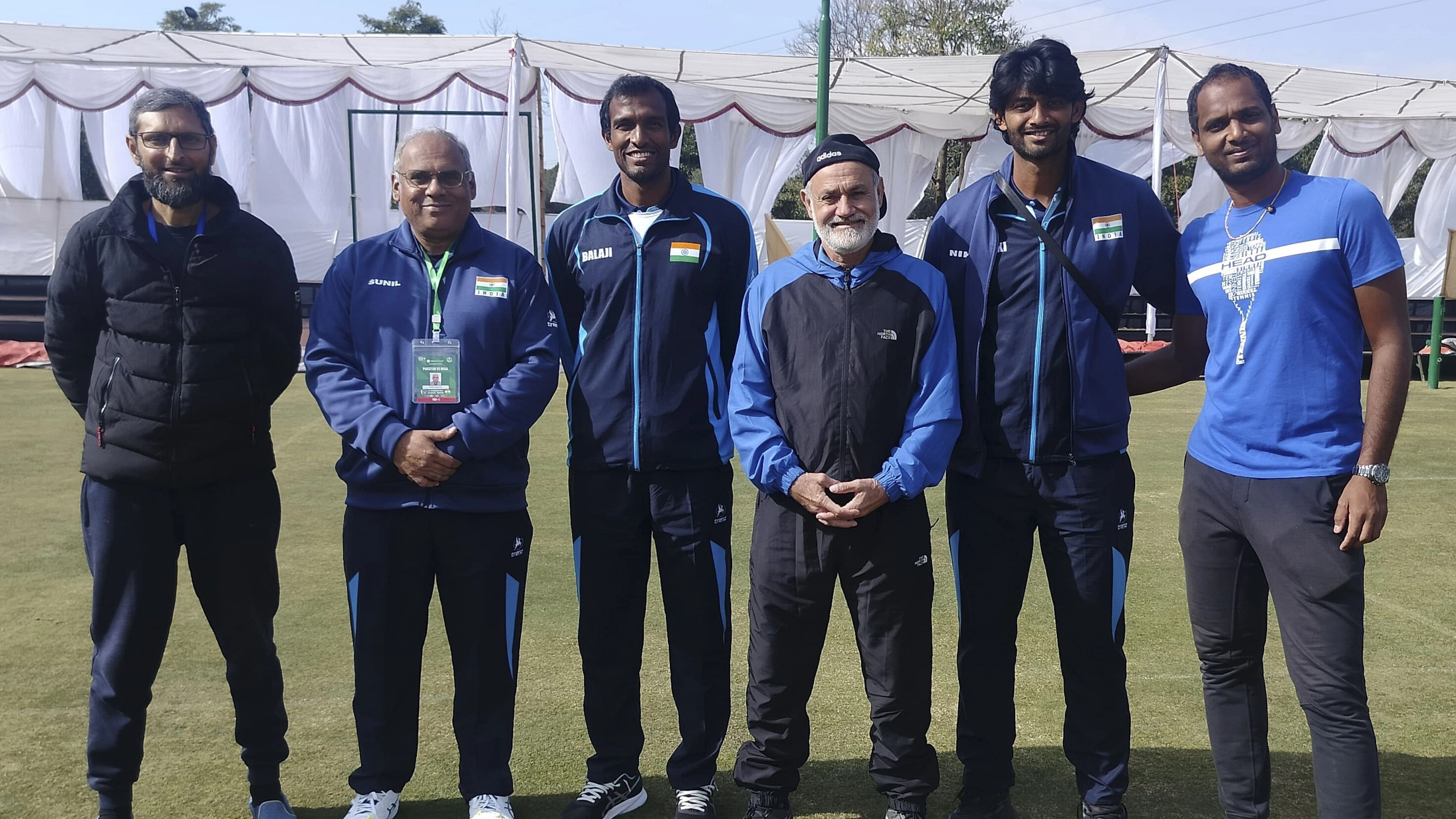 <div class="paragraphs"><p>Indian Davis Cup team members N. Sriram Balaji (3L), Niki Poonacha (2R) and Ramkumar Ramanathan (R) with Team Manager Sunil Yajaman (2L), former Pakistani player Hameed ul Haq (C) and Pakistan Tennis Federation (PTF) official Asim Shafiq (L) at a training session, in Islamabad, Thursday, February 1, 2024. </p></div>