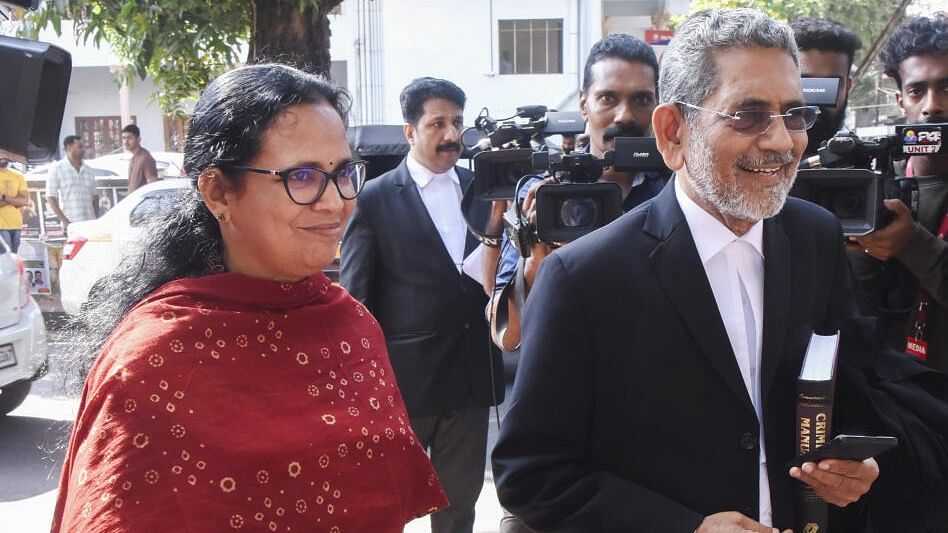 <div class="paragraphs"><p>Late TP Chandrasekharan's wife and RMP MLA K K Rema comes of the court in Kochi with her lawyer after the verdict.&nbsp;</p></div>