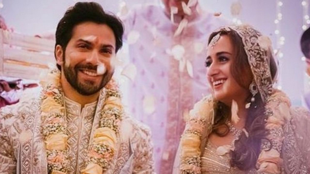 <div class="paragraphs"><p>Bollywood star Varun Dhawan with wife Natasha Dalal on their wedding.</p></div>