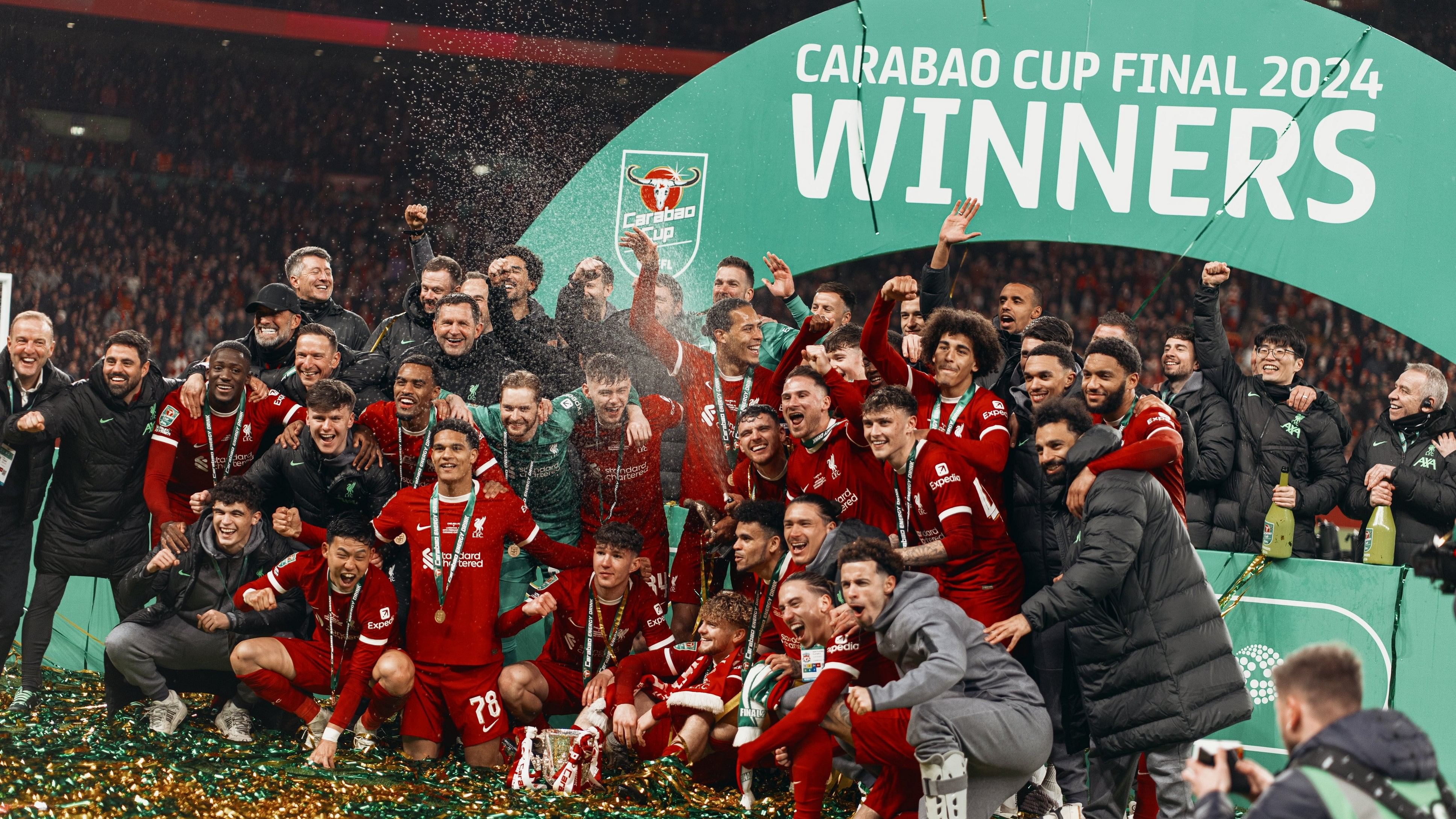 <div class="paragraphs"><p>A photo of Liverpool players celebrating winning the Carabao Cup 2024.</p></div>