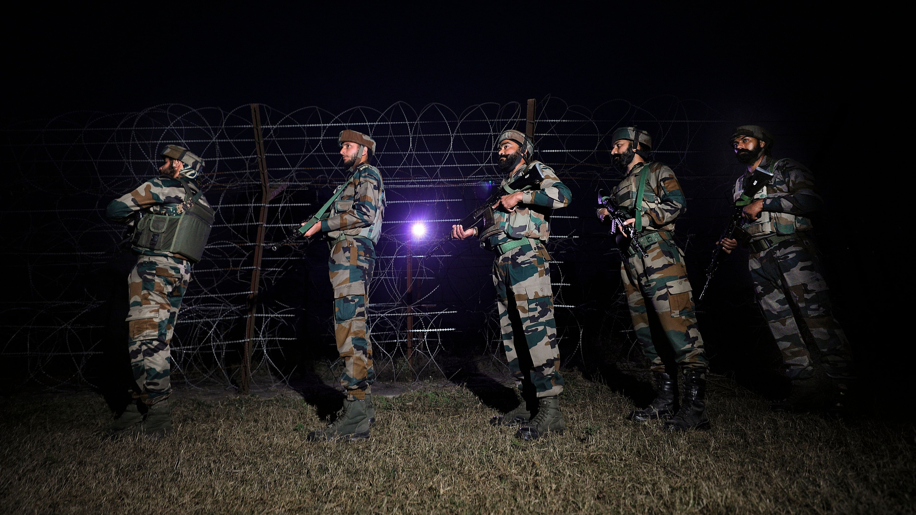 <div class="paragraphs"><p>A representational picture of Indian Army soldiers stand guard near the Line of Control (LoC).</p></div>