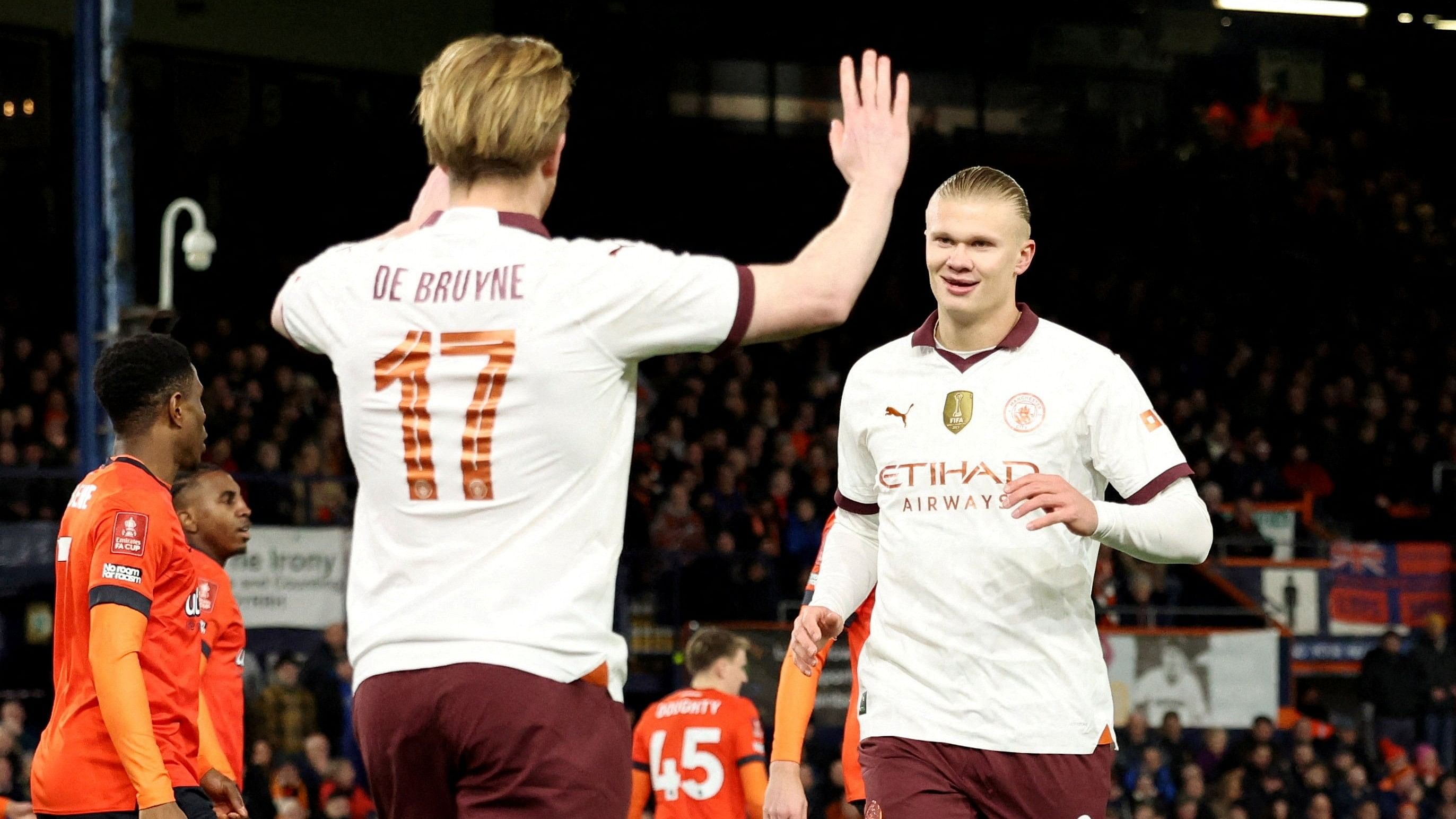 <div class="paragraphs"><p>Manchester City's Erling Haaland celebrating scoring their first goal with Kevin De Bruyne.</p></div>