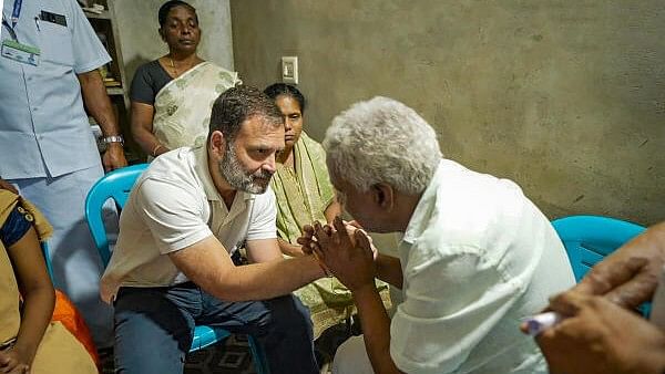 <div class="paragraphs"><p>Congress MP Rahul Gandhi meets the family of Ajeesh, a forest watchman who was killed in an elephant attack, in Wayanad, Kerala, Sunday, Feb 18, 2024.</p></div>