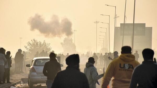 <div class="paragraphs"><p>Police use tear gas to disperse protesting farmers gathered at the Punjab-Haryana Shambhu border during the second day of their 'Dilli Chalo' march, near Patiala, Wednesday, Feb. 14, 2024.</p></div>