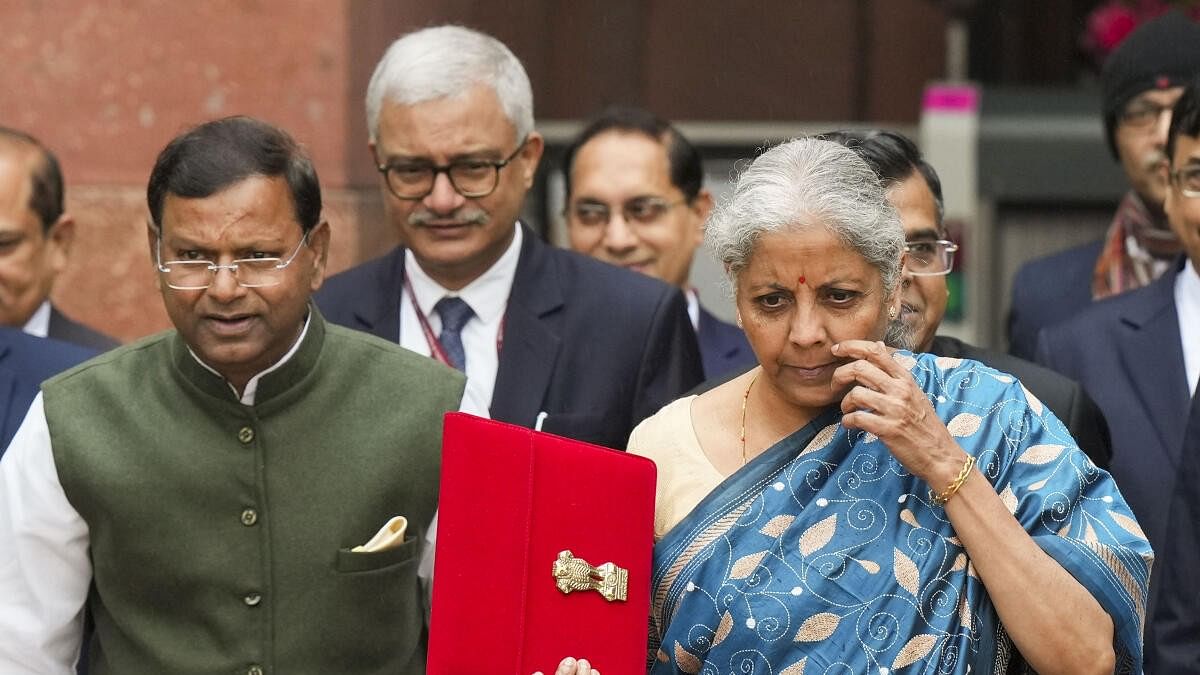 <div class="paragraphs"><p>Union Finance Minister Nirmala Sitharaman and other officials outside the Finance Ministry ahead of the presentation of Interim Budget 2024, in New Delhi, Thursday, Feb. 1, 2024.</p></div>