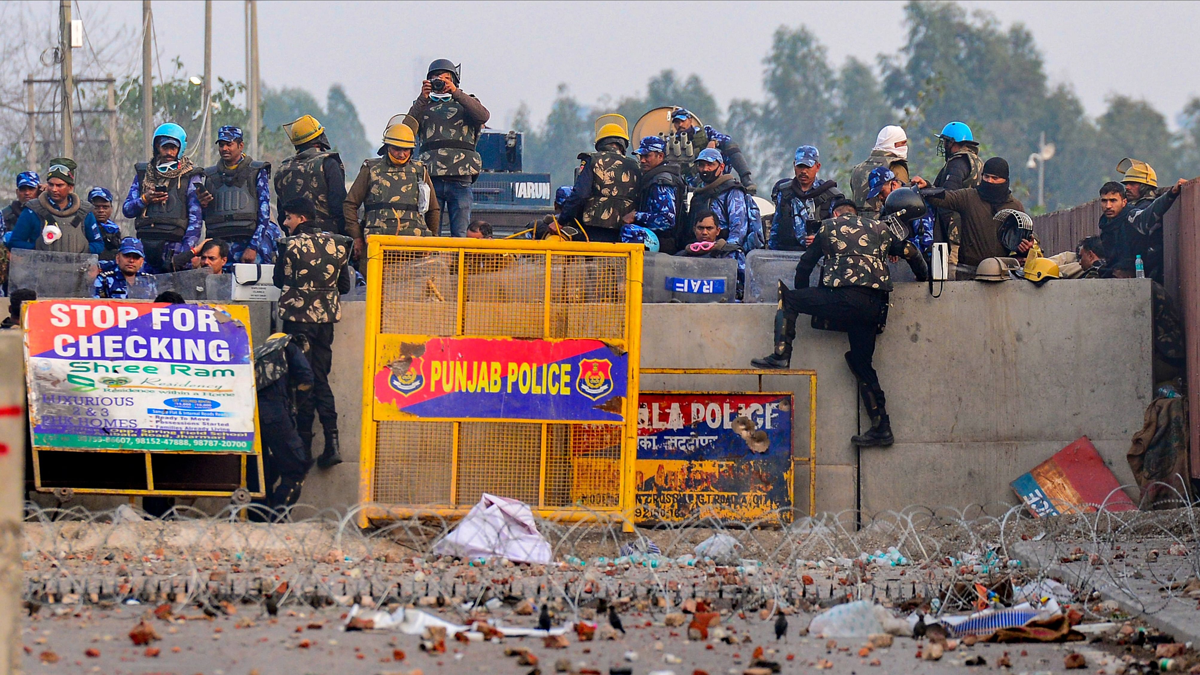 <div class="paragraphs"><p>Security personnel stand guard during the farmers' protest  at the Punjab-Haryana Shambhu Border, in Patiala district.</p></div>