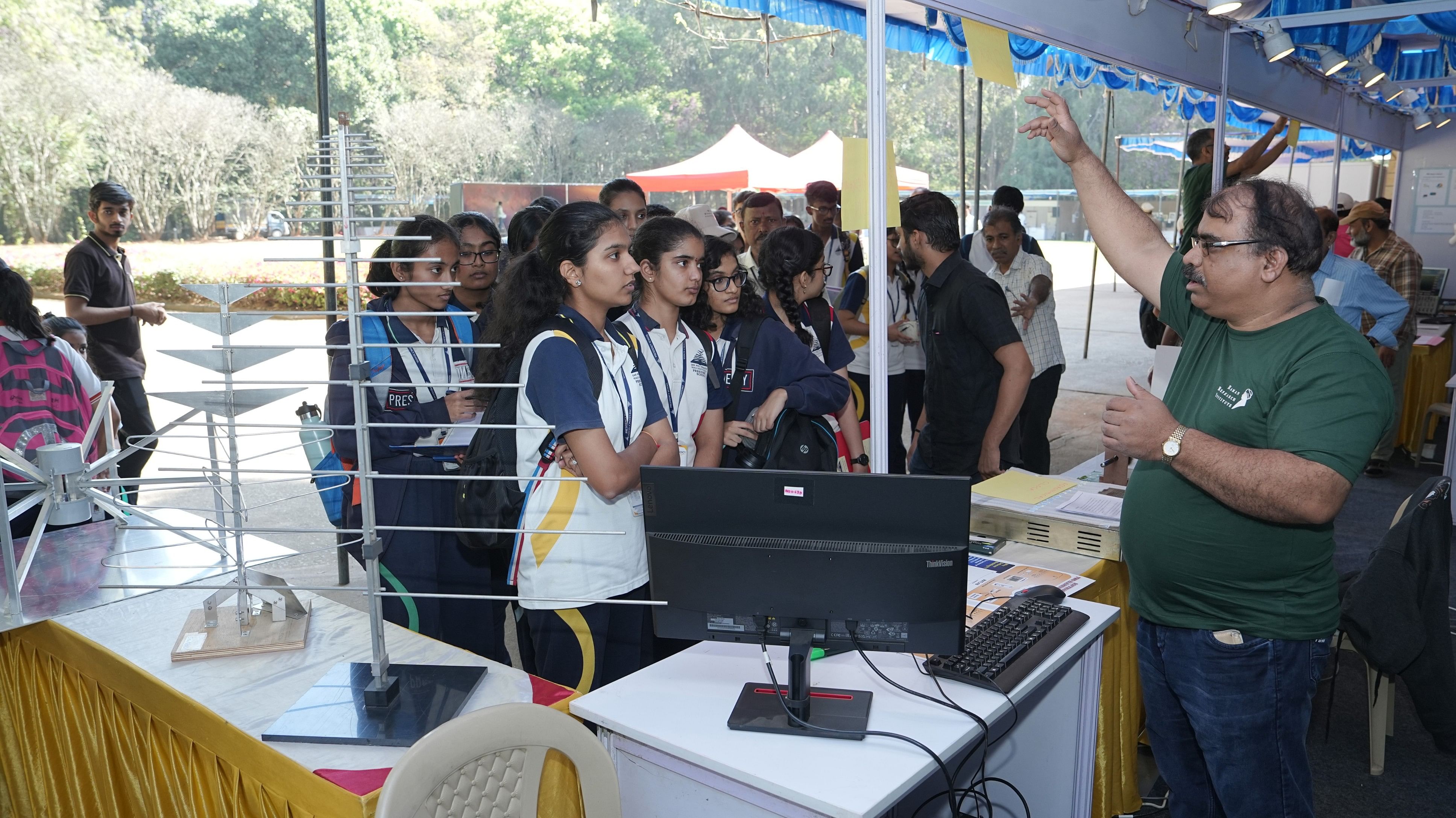 <div class="paragraphs"><p>Students engage with RRI research scholars and engineers displaying science experiments and demonstrations. </p></div>