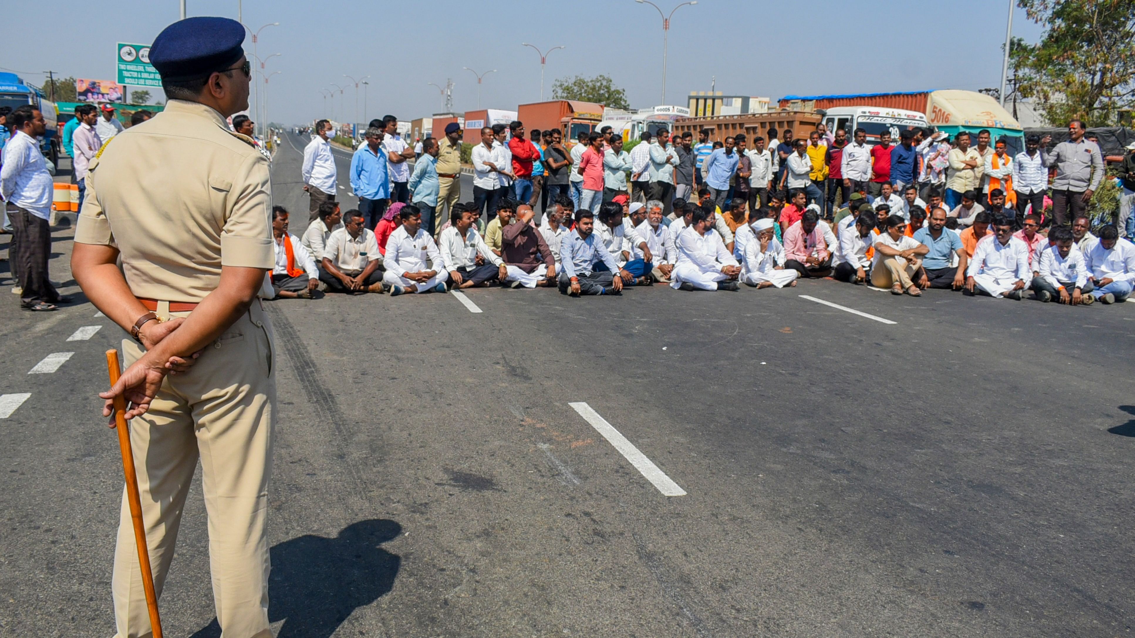 <div class="paragraphs"><p>People under the banner of Sakal Maratha Samaj block Pune-Solapur highway during a 'Rasta Roko' protest over Maratha reservation issue, in Solapur, Saturday, Feb. 24, 2024. </p></div>