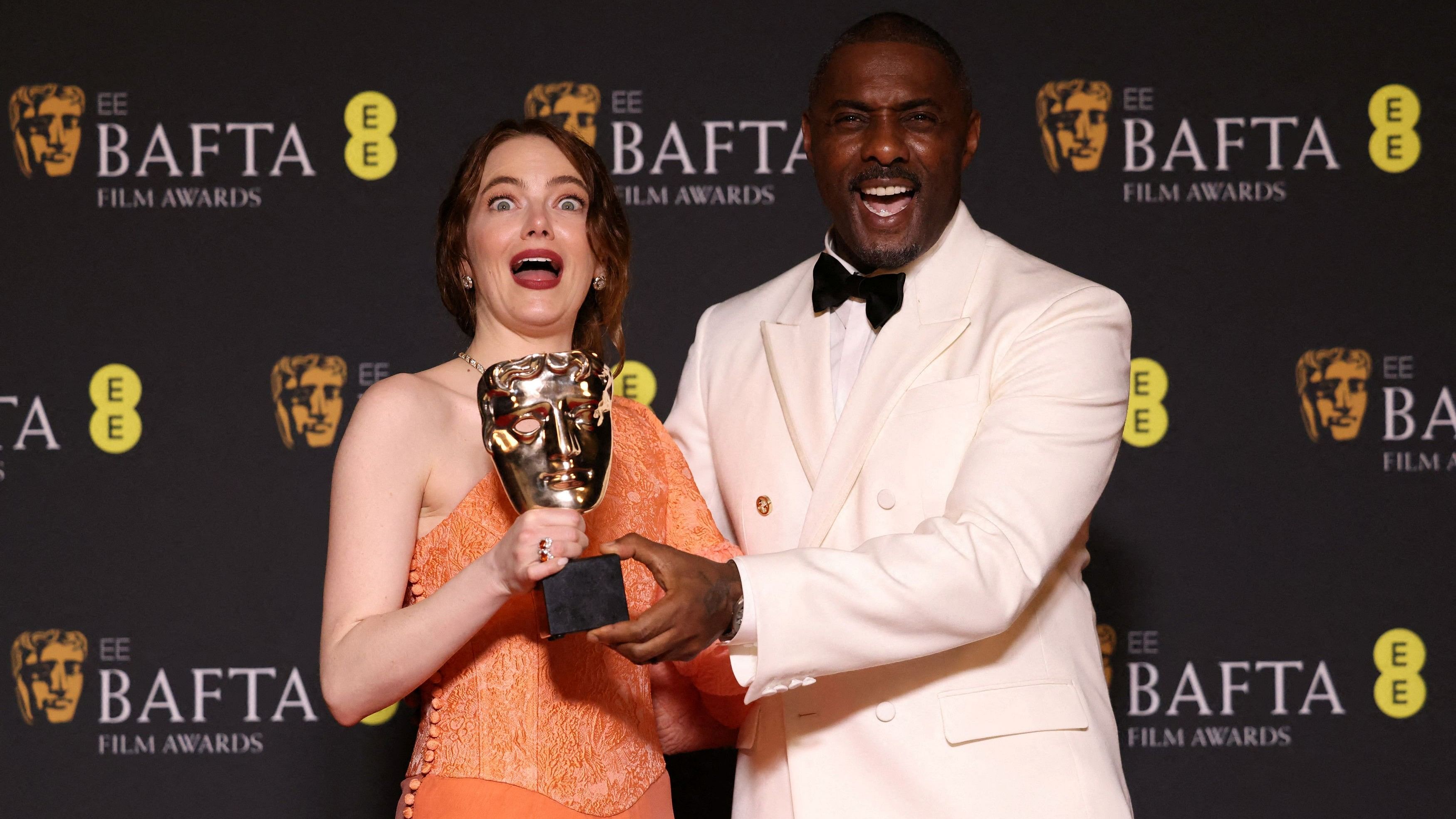 <div class="paragraphs"><p>Emma Stone poses in the winners room with her award for Leading Actress for "Poor Things" next to Idris Elba, during the 2024 British Academy of Film and Television Awards  at the Royal Festival Hall in the Southbank Centre, London, Britain.</p></div>