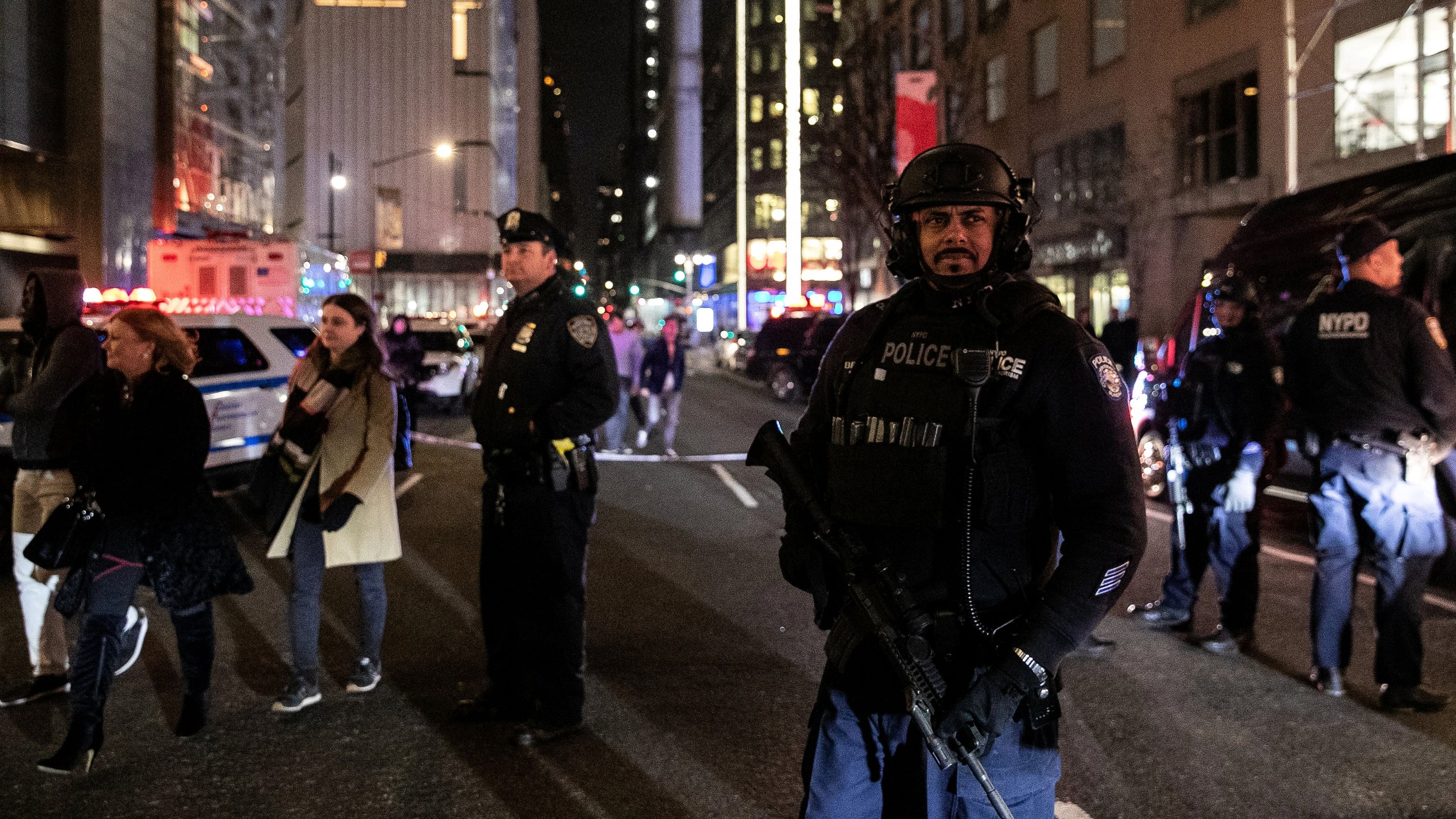 <div class="paragraphs"><p>A file photo of an armed NYPD police officer guarding&nbsp;in the Manhattan borough of New York City</p></div>