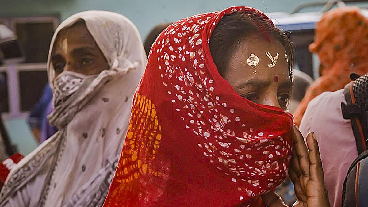 <div class="paragraphs"><p>Local women wait to meet NCW Chairperson Rekha Sharma (not seen) during her visit to Sandeshkhali in West Bengal.( Representative image)</p></div>