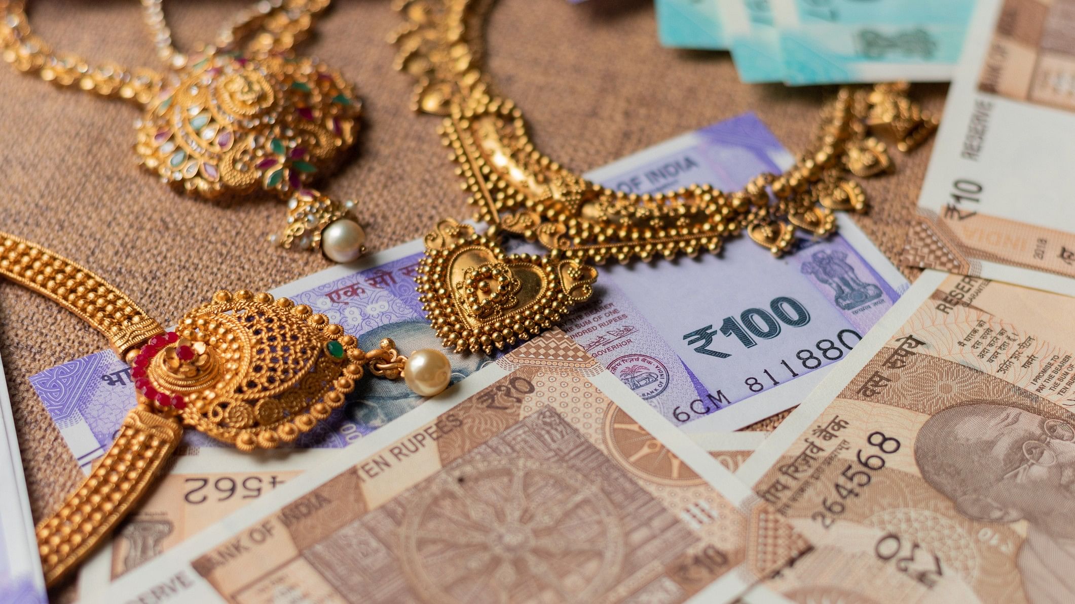 <div class="paragraphs"><p>Representative image showing money and jewellery.</p></div>