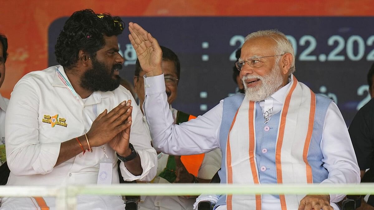 <div class="paragraphs"><p>Prime Minister Narendra Modi with Tamil Nadu BJP President K Annamalai during the closing ceremony of the BJP's ‘En Mann Ek Makkal’ padyatra, near Palladam in Tirupur</p></div>