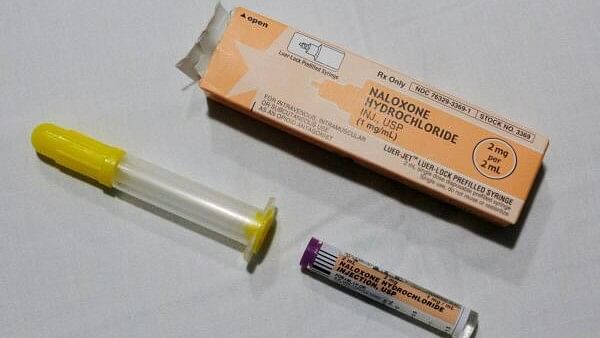 <div class="paragraphs"><p>Paramedics display a dose of the opioid overdose reversal drug Narcan, or Naloxone Hydrochloride.</p></div>