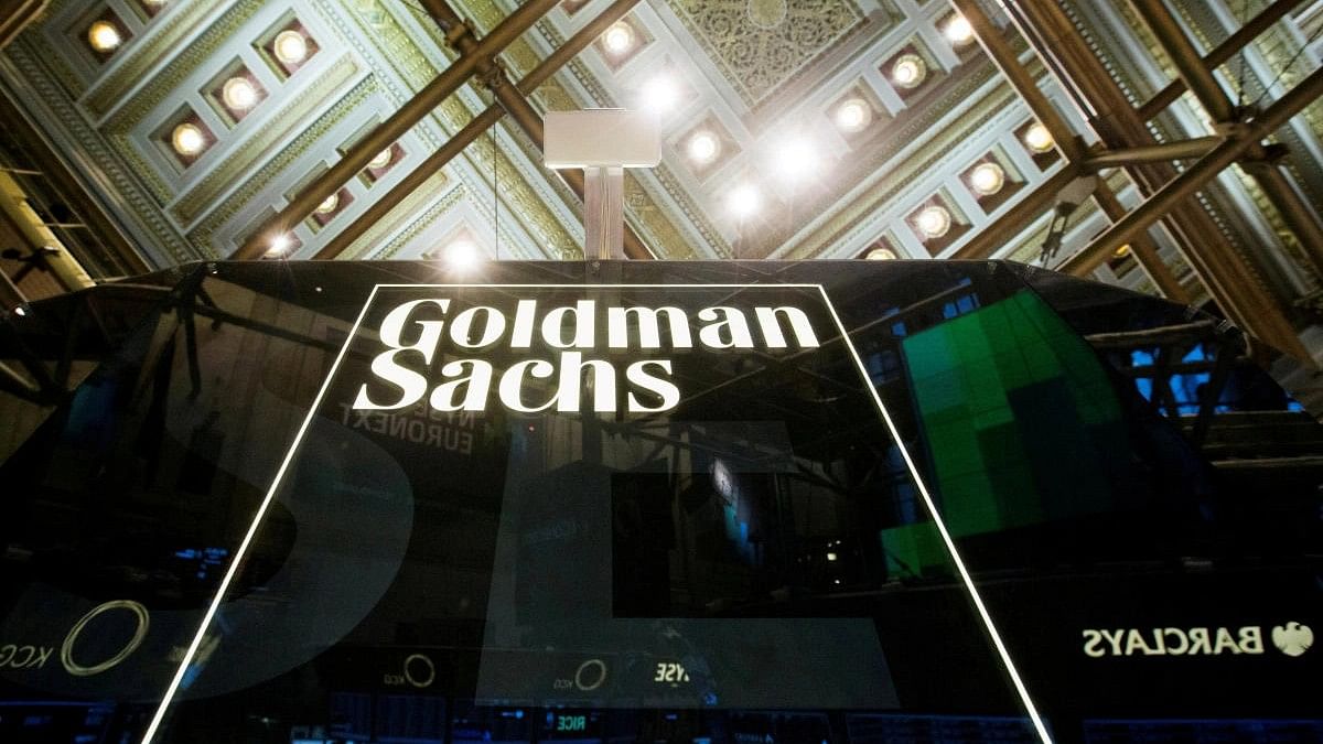 <div class="paragraphs"><p>Goldman Sachs sign is seen above floor of the New York Stock Exchange</p></div>